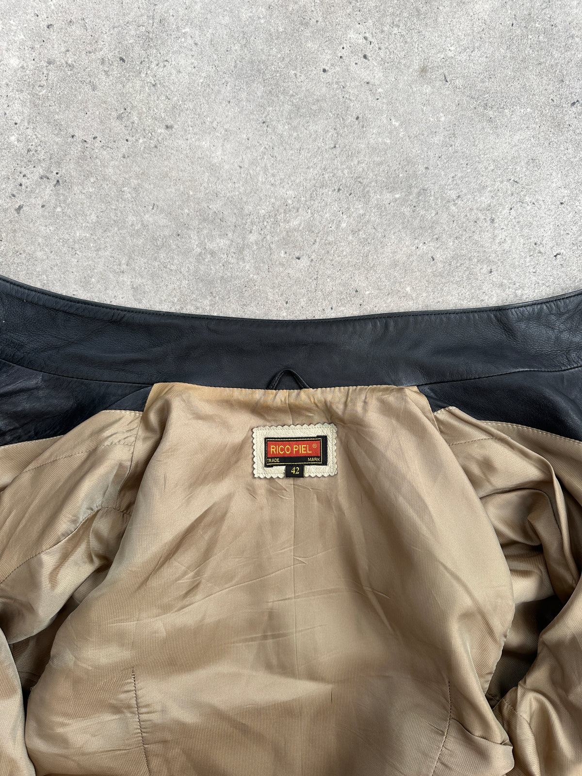 Vintage 1990s high neck leather jacket with contrast panels, size M, featuring classic vintage style and premium leather material.