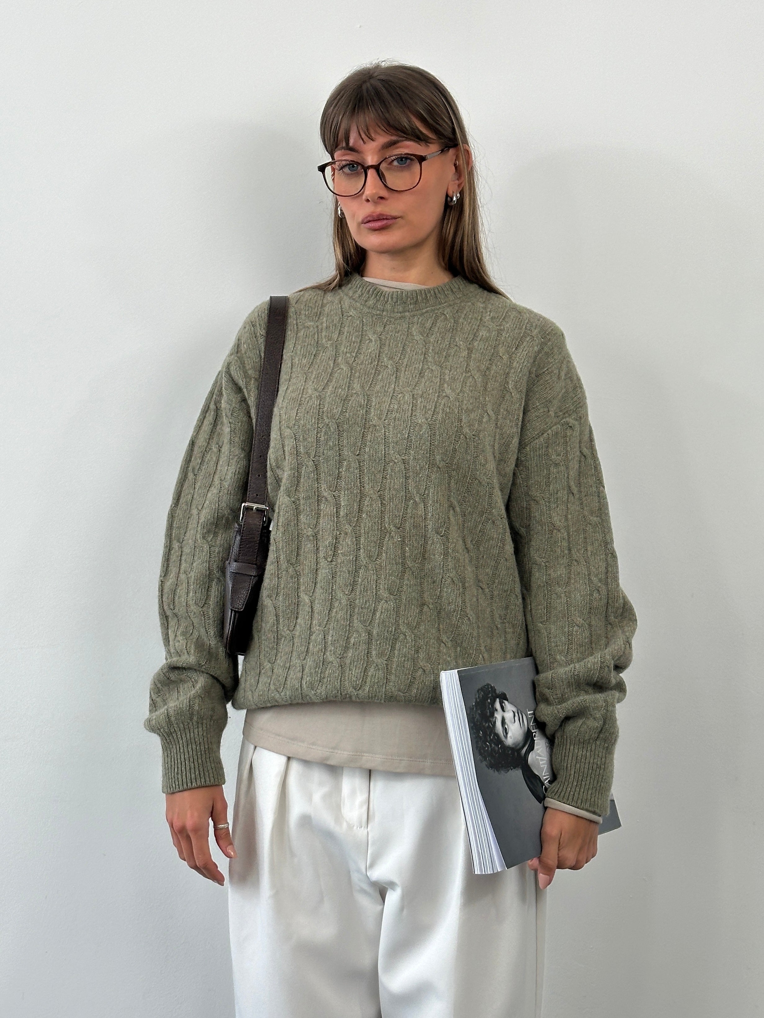 Vintage Italian 1990s wool knitted jumper in XL, cozy and stylish with intricate knit patterns and classic design.