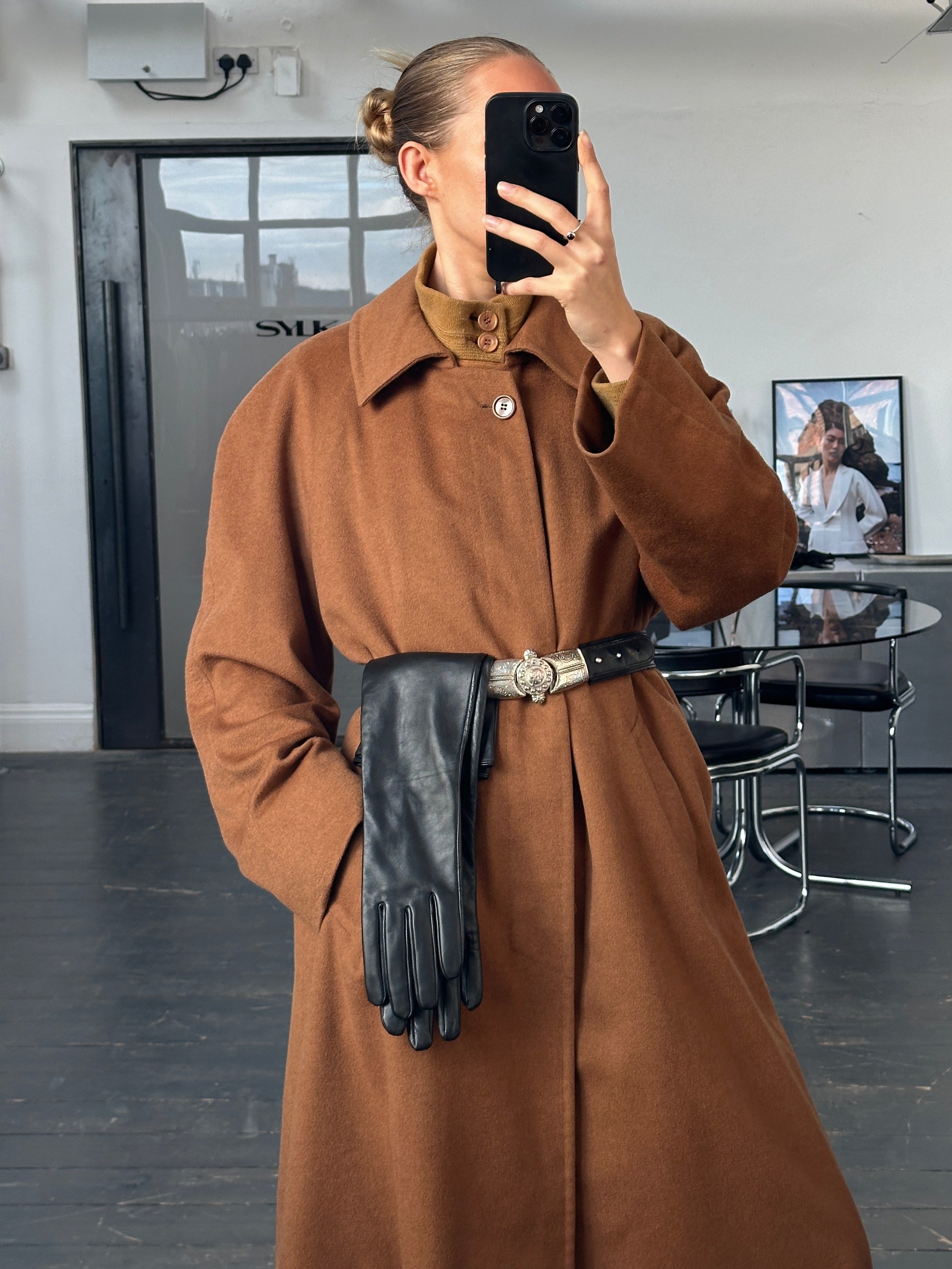 Vintage Italian 1970s pure cashmere coat with concealed placket, shown in size XL, featuring classic vintage style and soft texture.