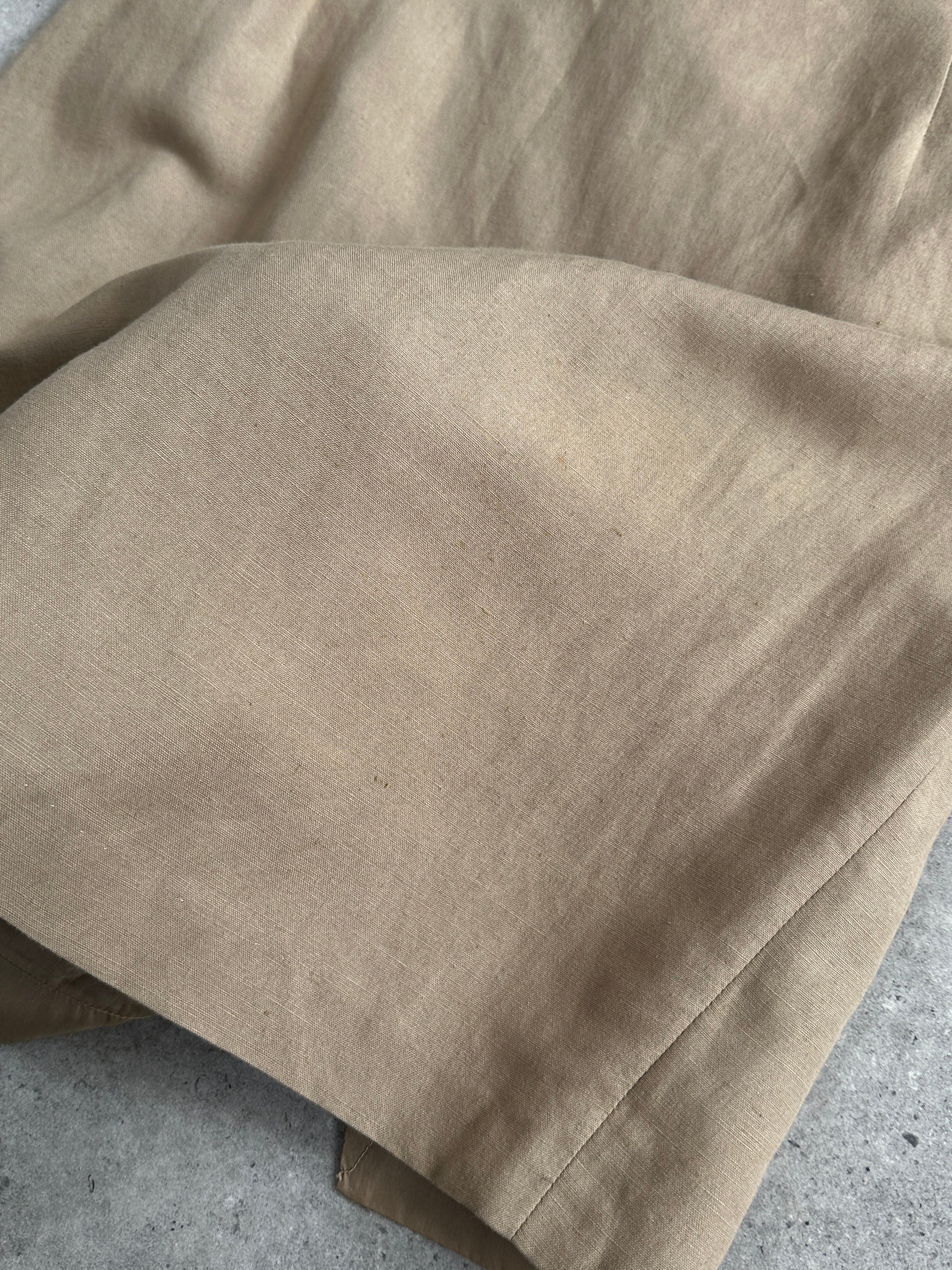 Marella Linen Mini Skirt in W26 style, showcasing a light, breathable fabric with a sleek, modern design perfect for warm weather.