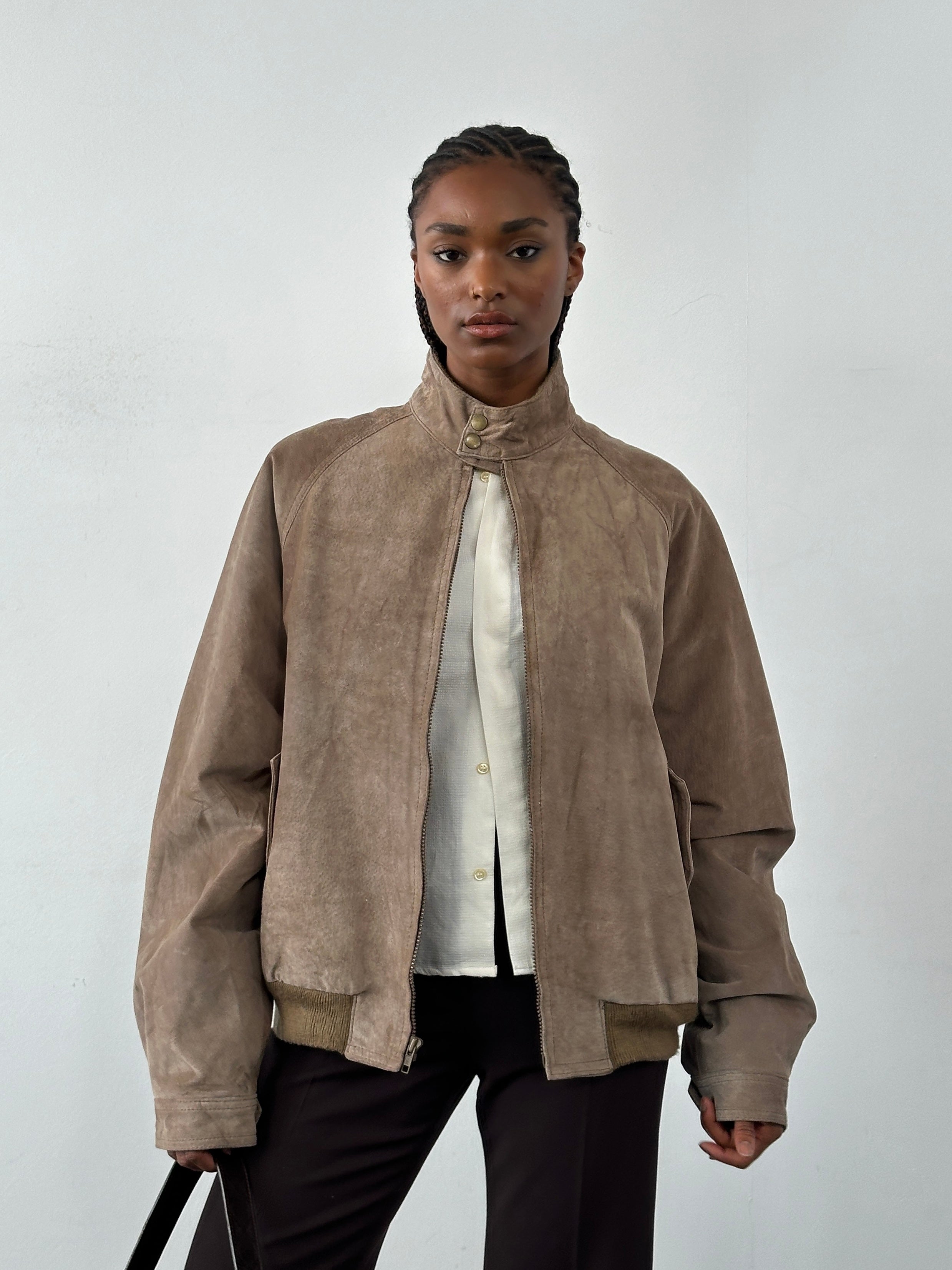 Vintage 1990s high neck suede bomber jacket in XL, showcasing classic style and soft tan suede fabric.