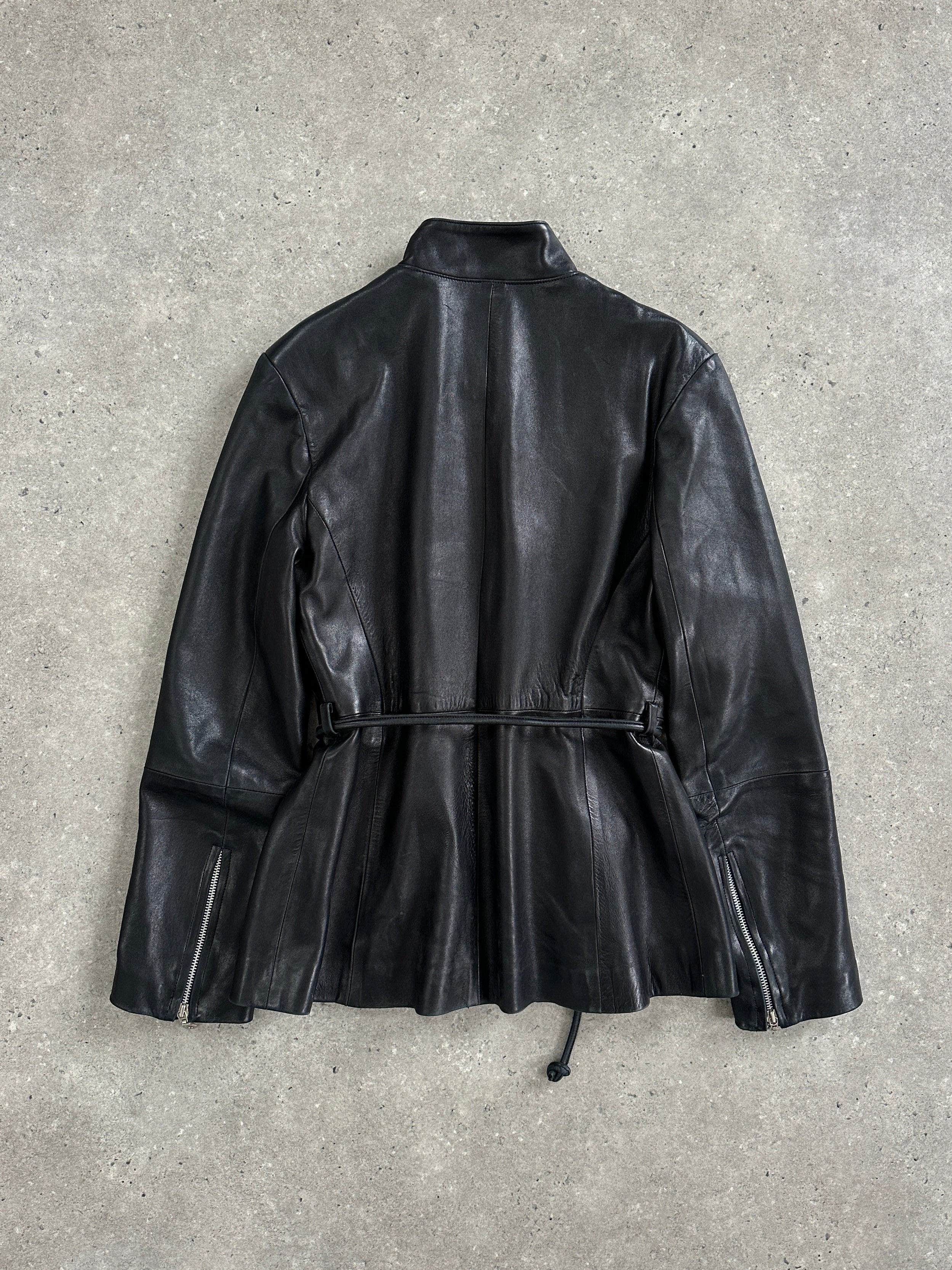 Vintage French 1990s leather jacket with high neck tie belt, in size S/M, styled with classic vintage details.