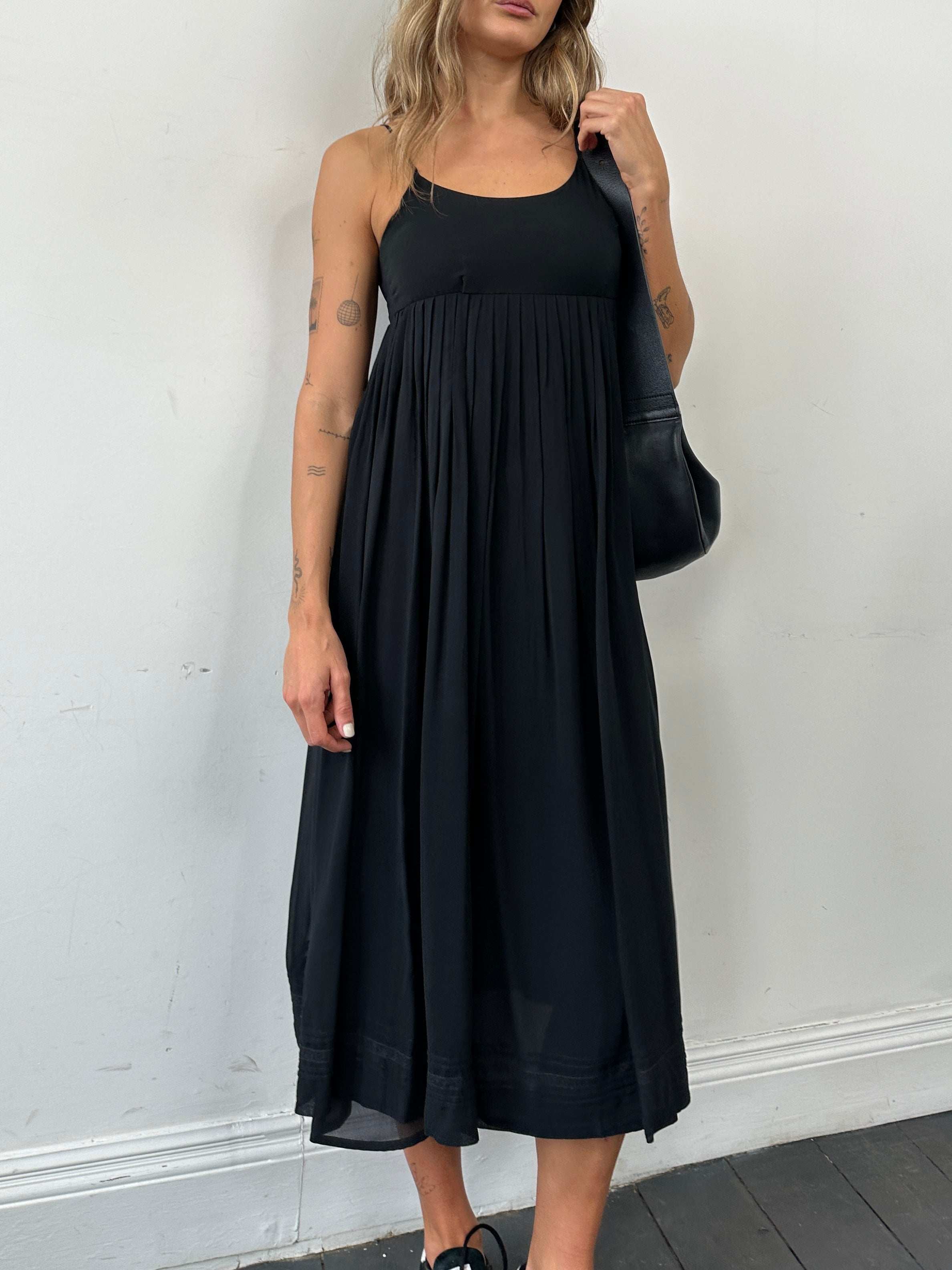 Laura Ashley XS pure silk pleated slip dress featuring a sleek, elegant design with soft pleats and a smooth silk finish.