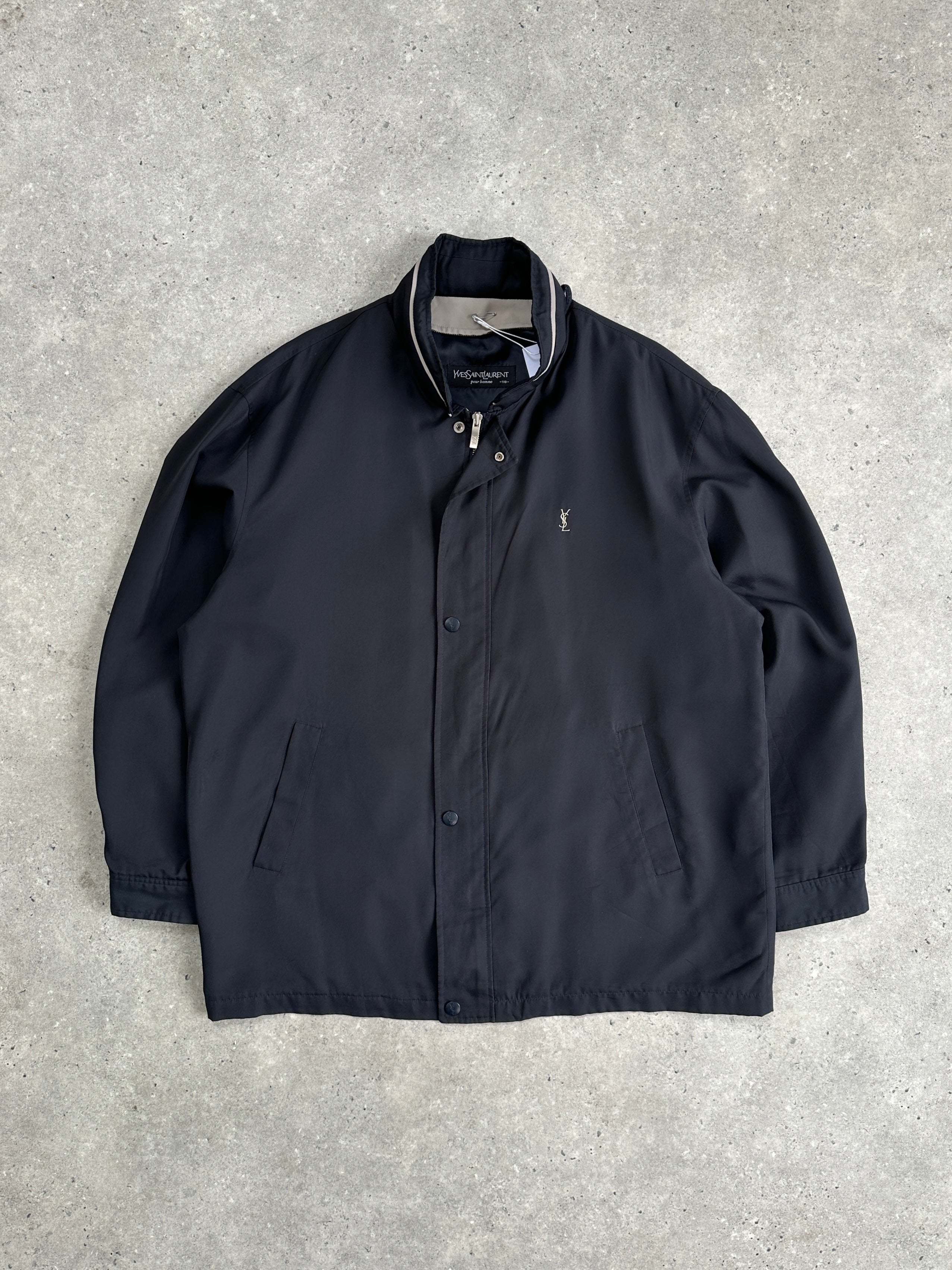 Yves Saint Laurent Pour Homme bomber jacket in XL/XXL, showerproof logo design, black color, front zipper, and ribbed cuffs.