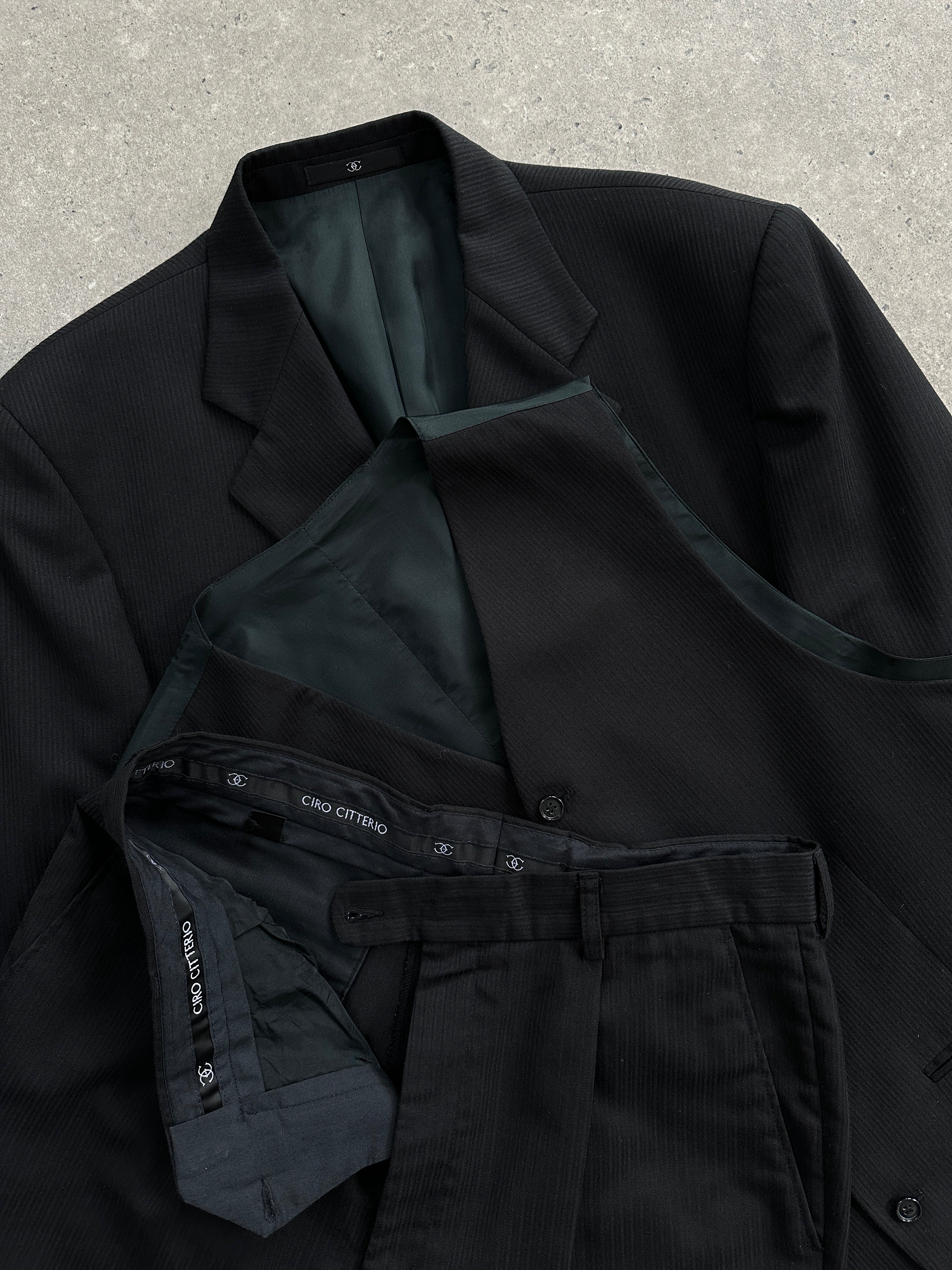 Vintage wool ribbed three-piece suit with tailored jacket, vest, and trousers in classic style, size 40S/W32.