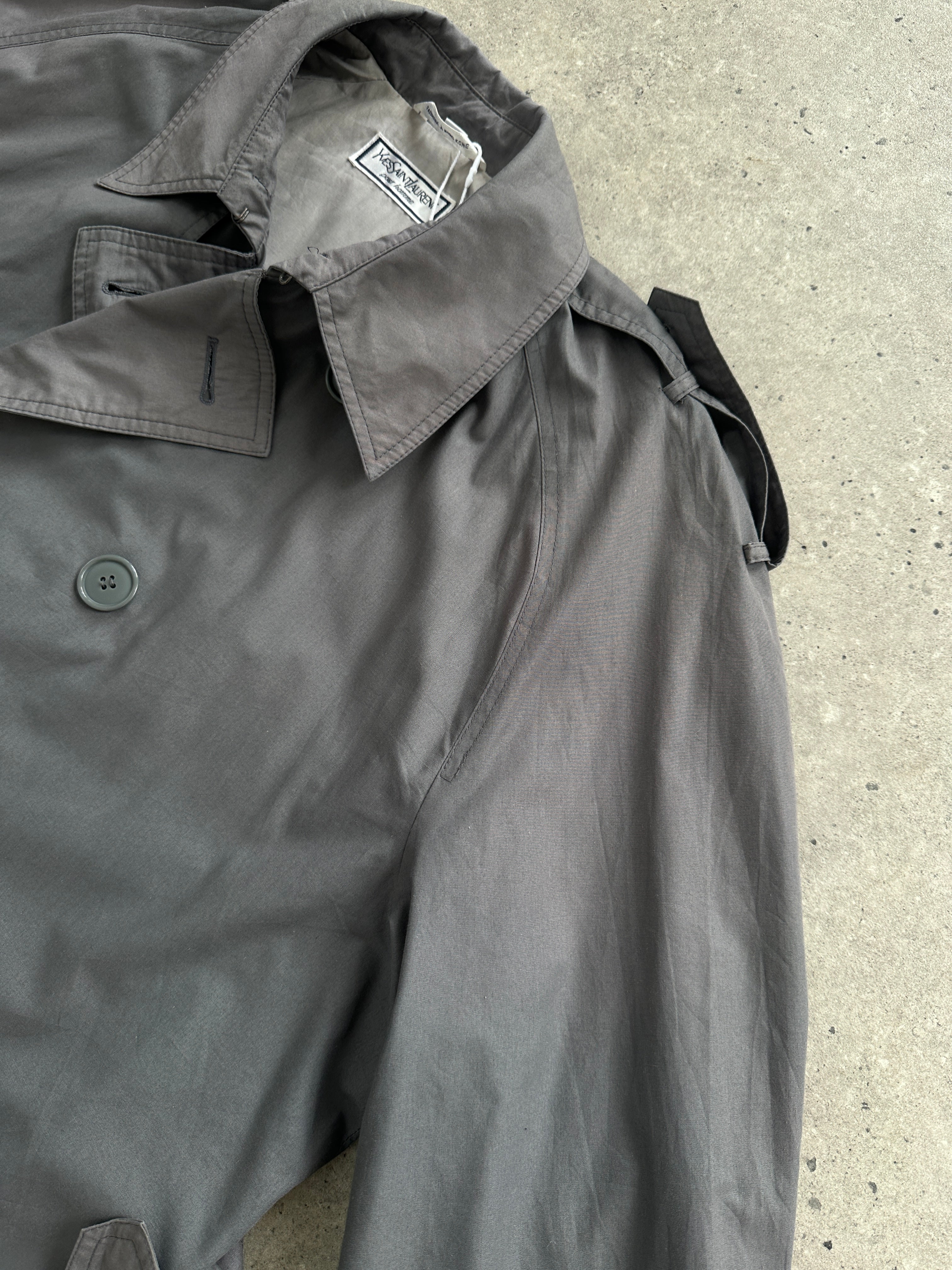 Yves Saint Laurent men's double-breasted belted trench coat in XL/XXL, showing classic design and stylish fit.