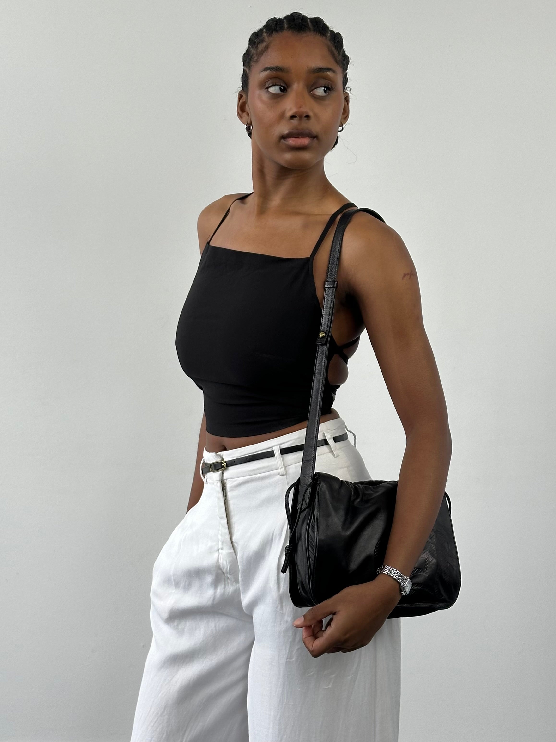 Vintage 2000s viscose back strap cropped top in black, featuring a fitted design and stylish back detail.