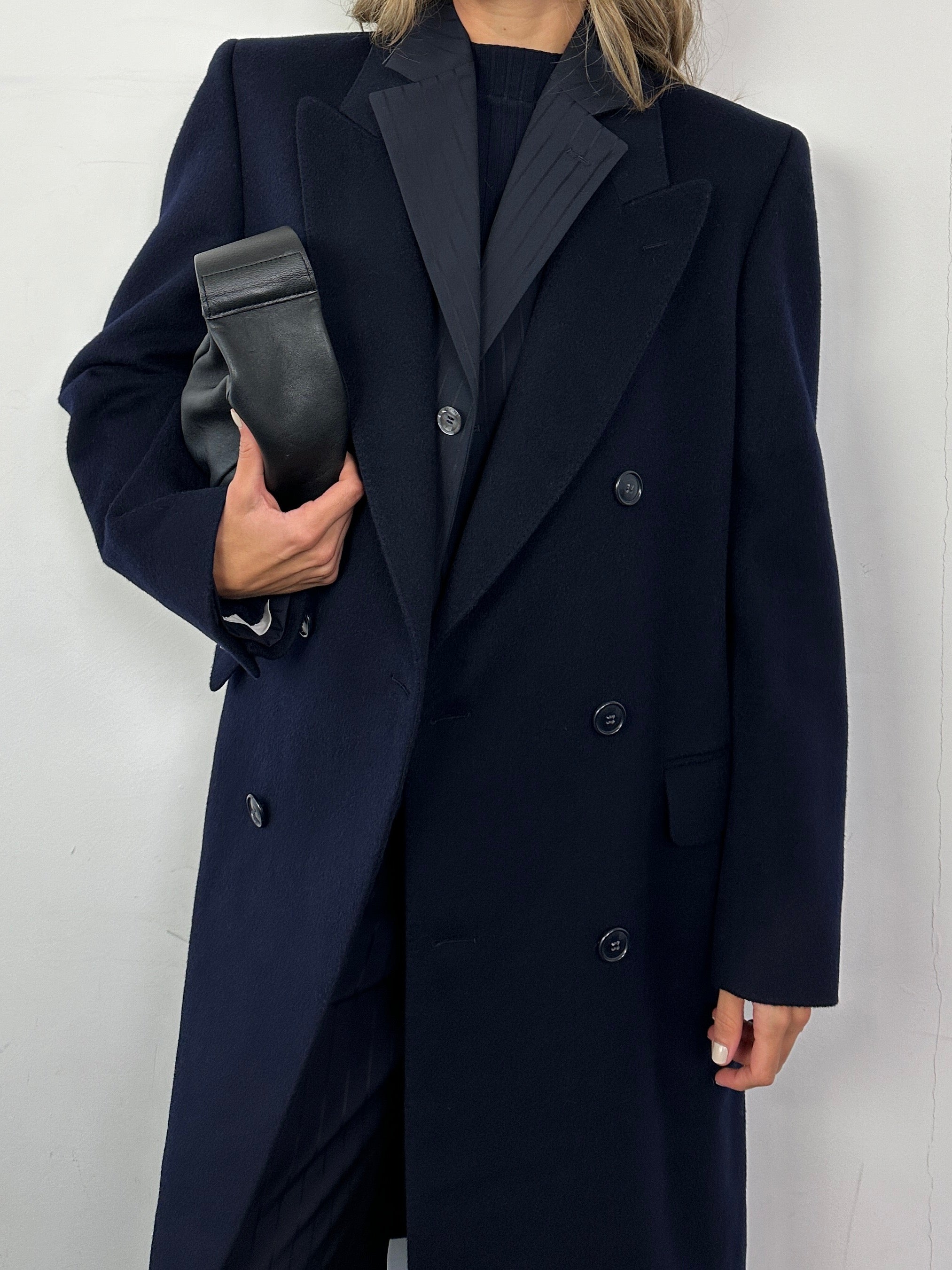 Vintage pure virgin wool double-breasted coat in size M/L, featuring classic style and tailored fit with lapels and button details.