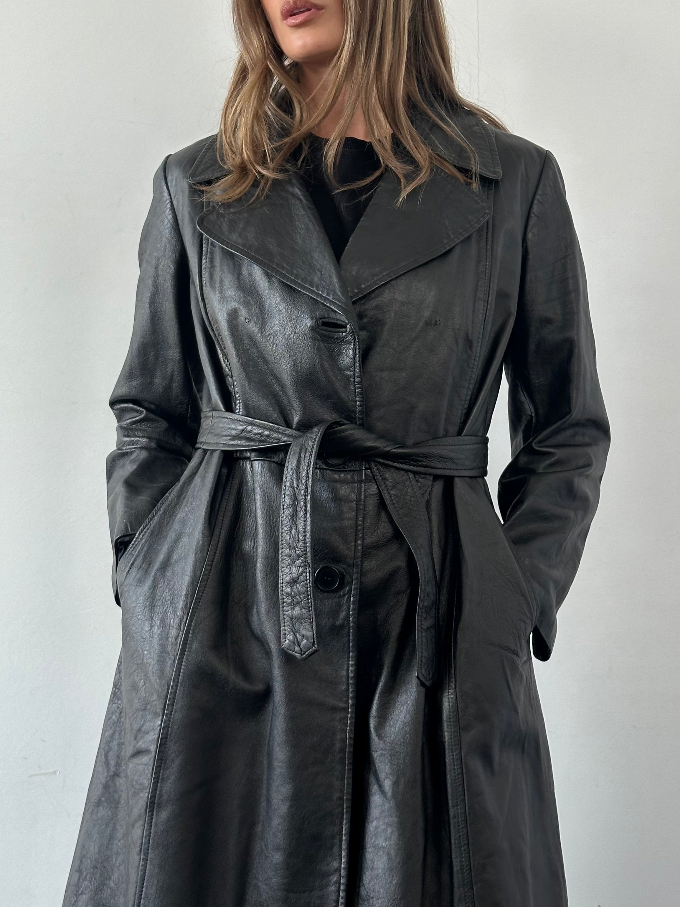 Vintage leather belted trench coat in M/L size, stylish and classic leather jacket with belt detail, front view showing texture and design