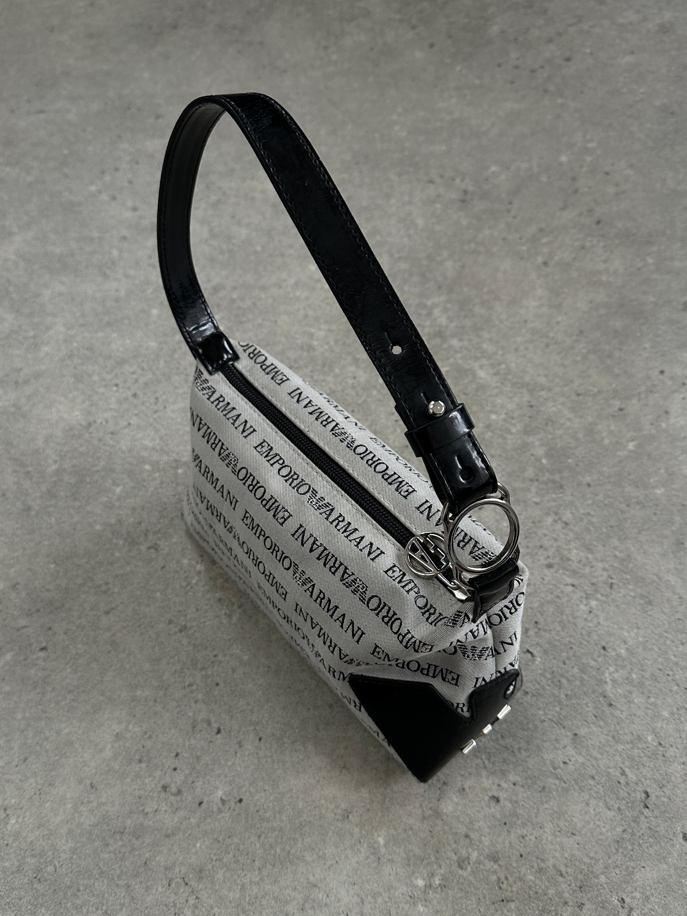 Emporio Armani Monogram Shoulder Bag with logo pattern, featuring a sleek design and adjustable strap, made from durable materials.