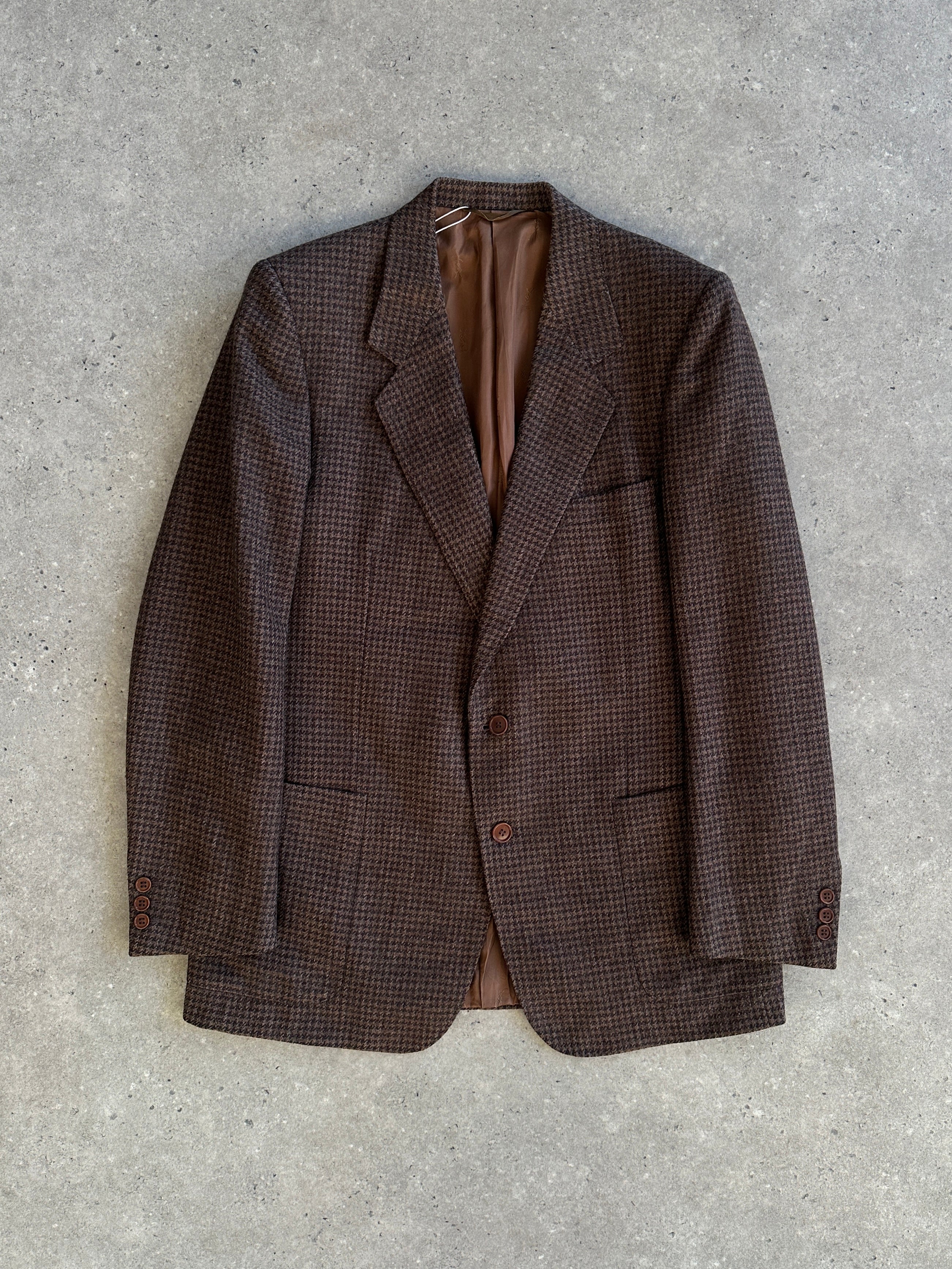 Yves Saint Laurent 1980s wool tweed single-breasted blazer in size L, featuring classic tailored design and timeless style.