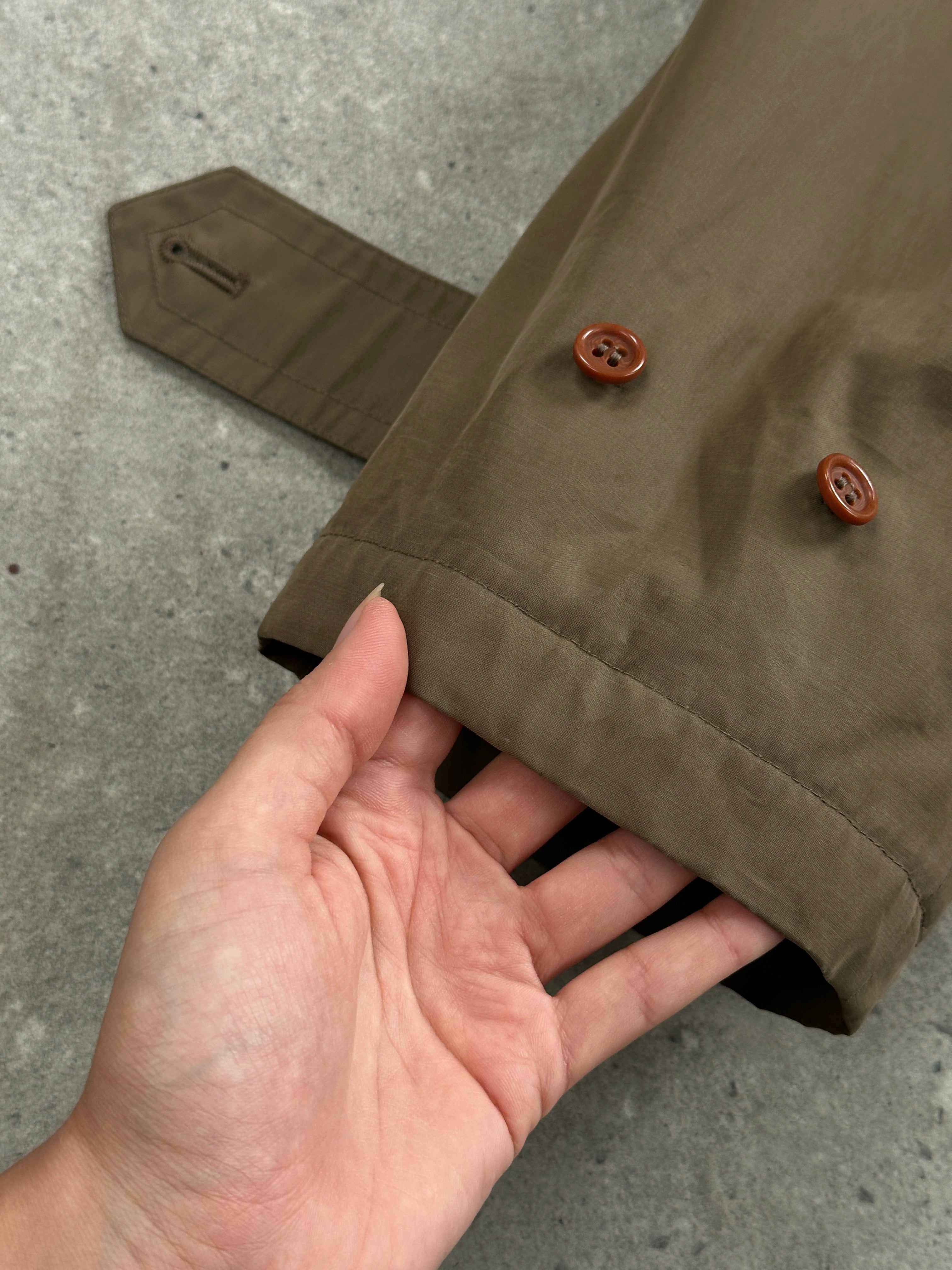Burberry 1990s cotton field trench coat in XL/XXL, beige color, classic design with double-breasted buttons and belt.