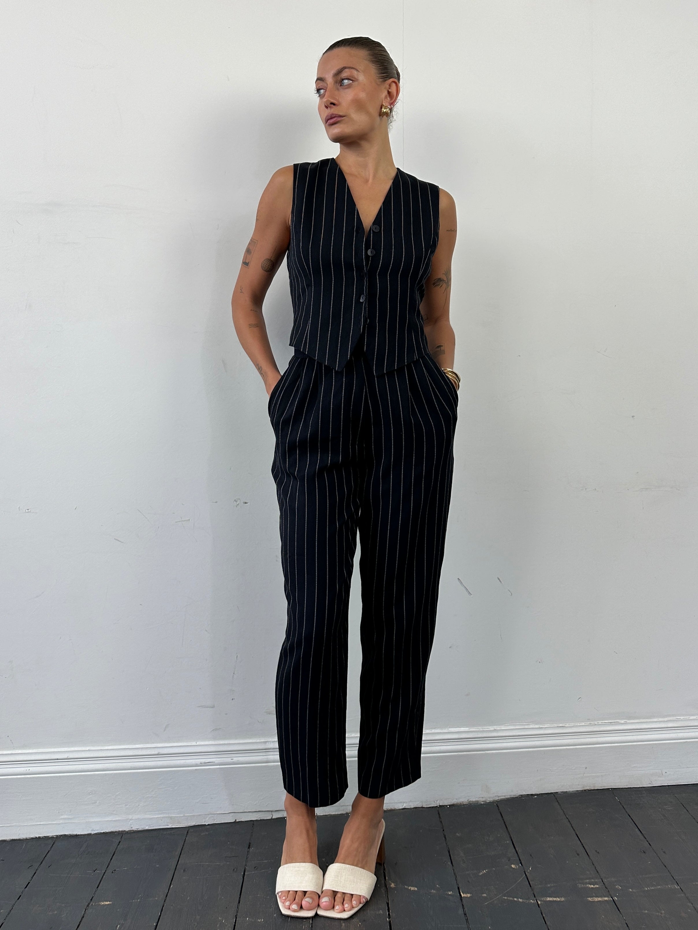 Vintage British vintage pinstripe two-piece waistcoat and trousers set, tailored fit in classic style, size M.
