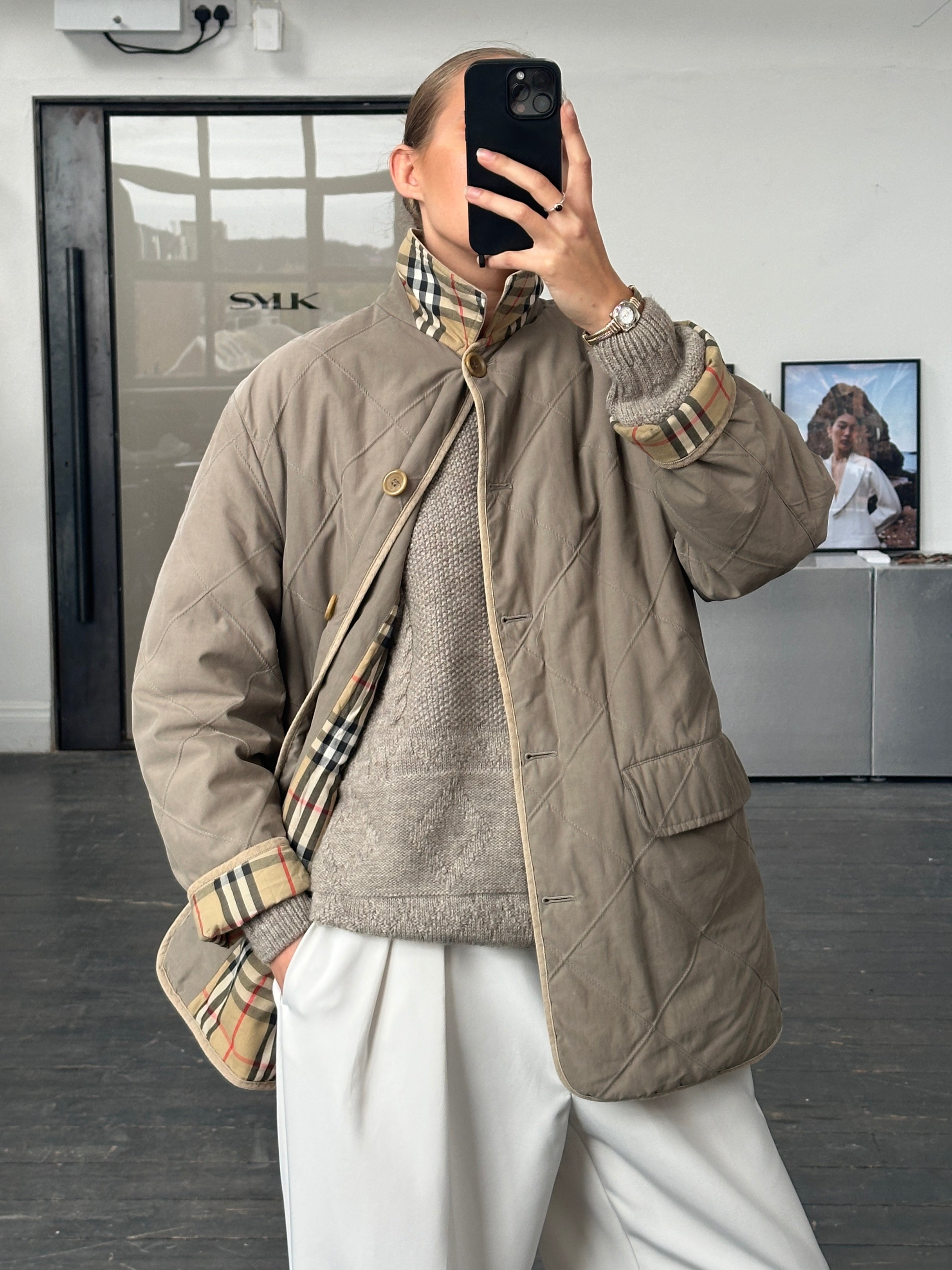 Burberry 1990s quilted Nova Check cord collar coat in size L, featuring classic check pattern and quilted design.