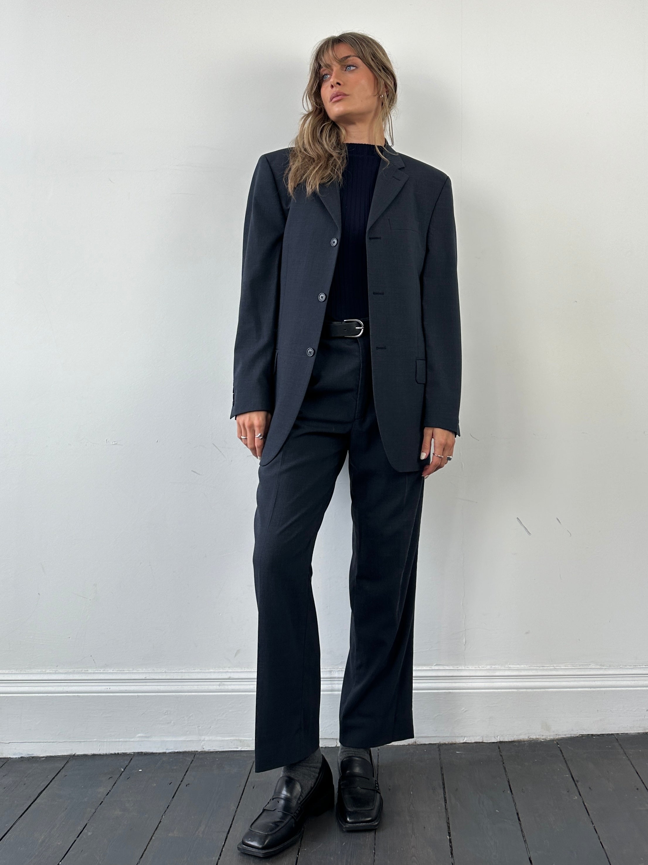 Vintage wool single-breasted jumpsuit in size 38R/W30, featuring classic tailoring and a vintage-inspired design.