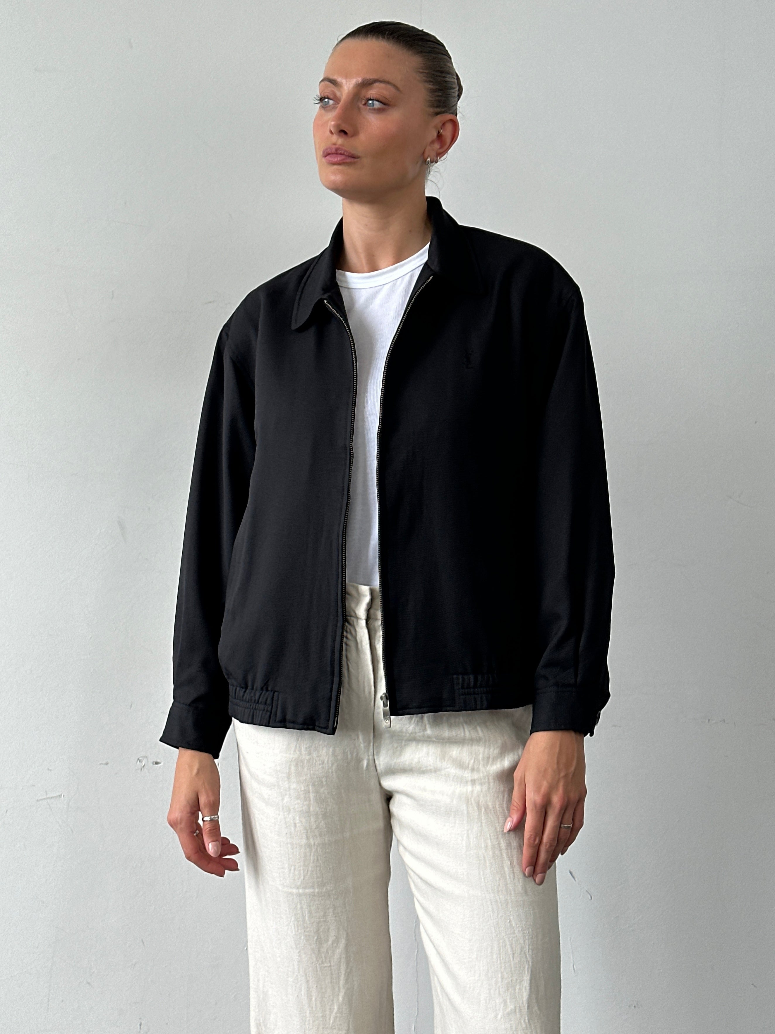 Yves Saint Laurent Pour Homme logo bomber jacket in size M, black with signature branding and classic bomber style.