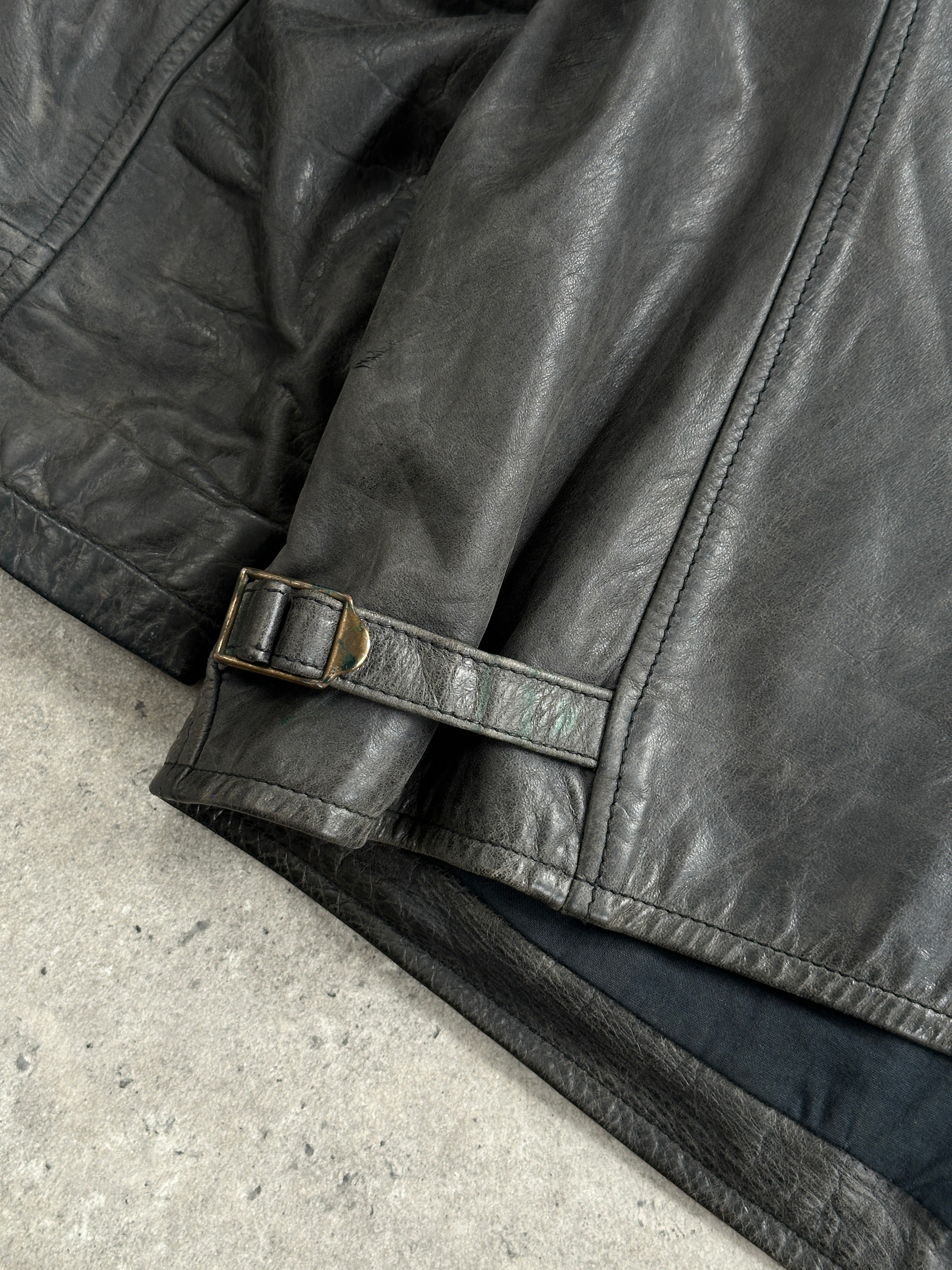 Vintage 1990s boxy leather jacket in aged brown from Vintage, featuring a classic L/XL fit and distressed leather detail.