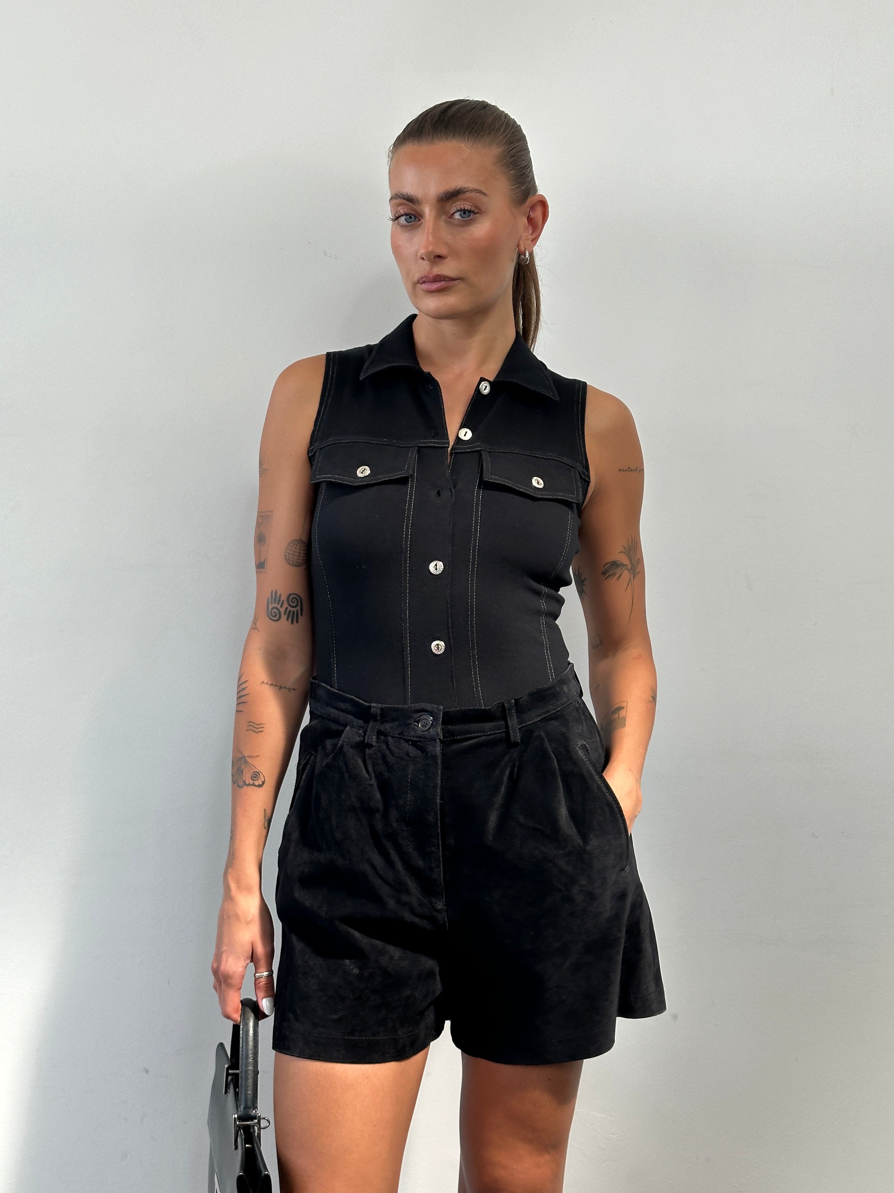 Vintage cotton contrast stitch bodysuit top in size small, featuring classic design and stylish stitching details.