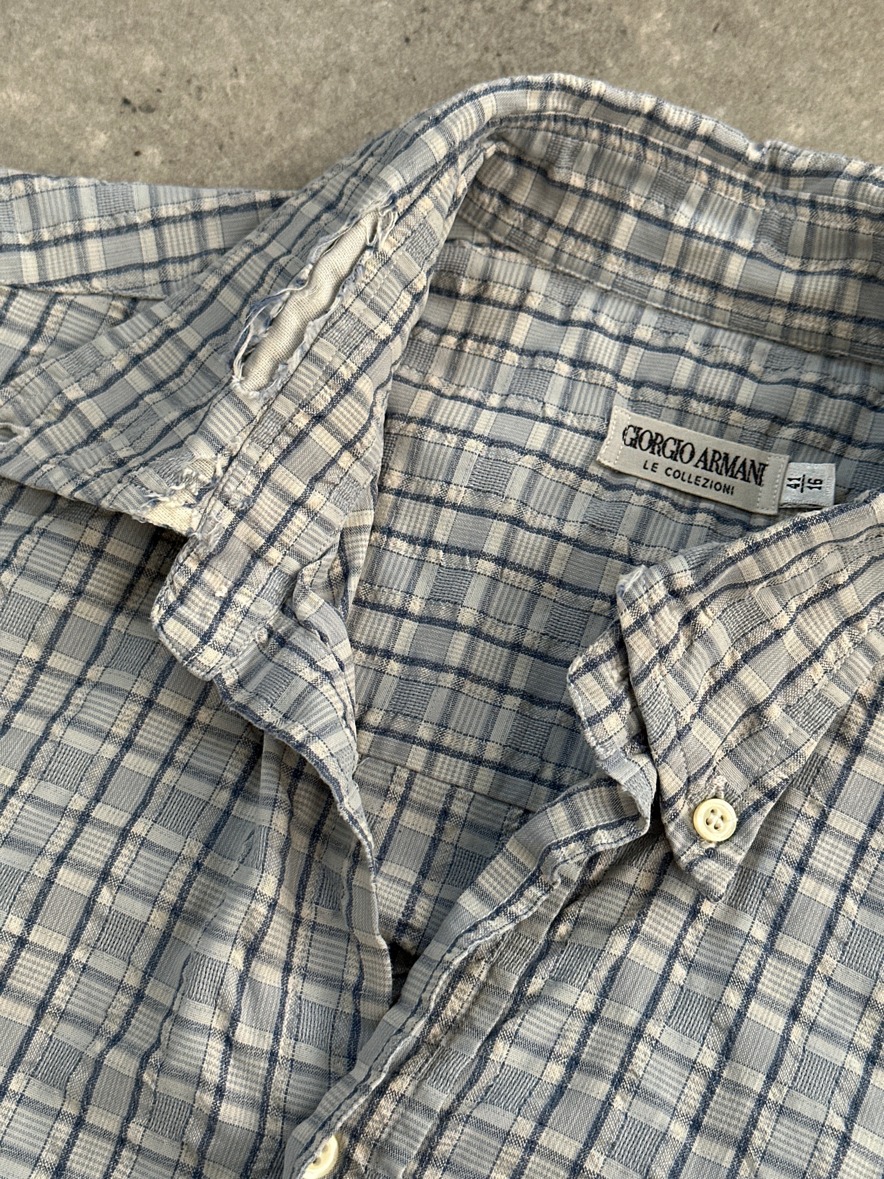 Giorgio Armani check pure cotton shirt in size L, featuring a classic pattern and tailored fit, displayed on a hanger.
