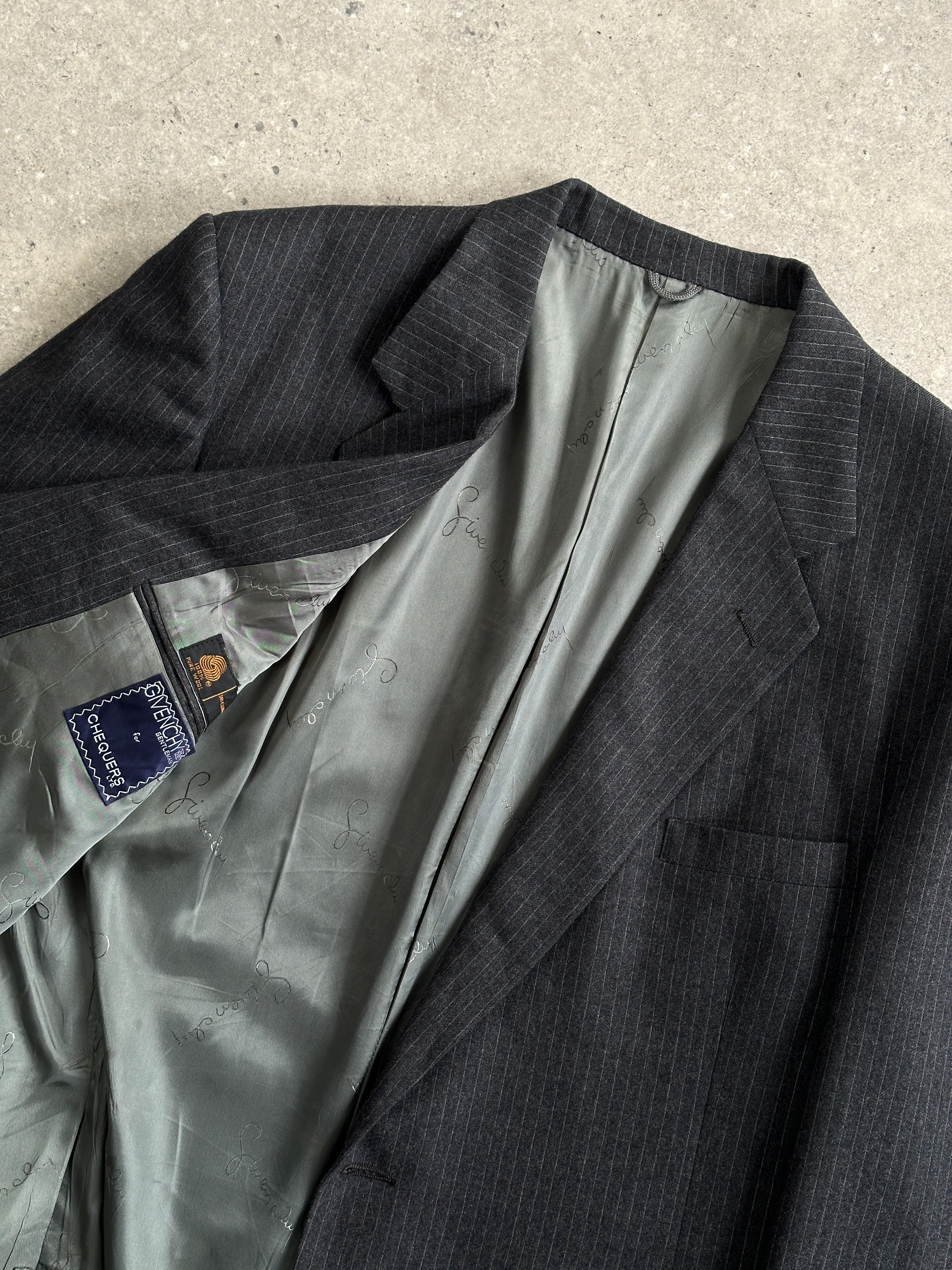 Givenchy pinstripe pure wool blazer, single-breasted design in size L/XL, tailored for a sophisticated look.