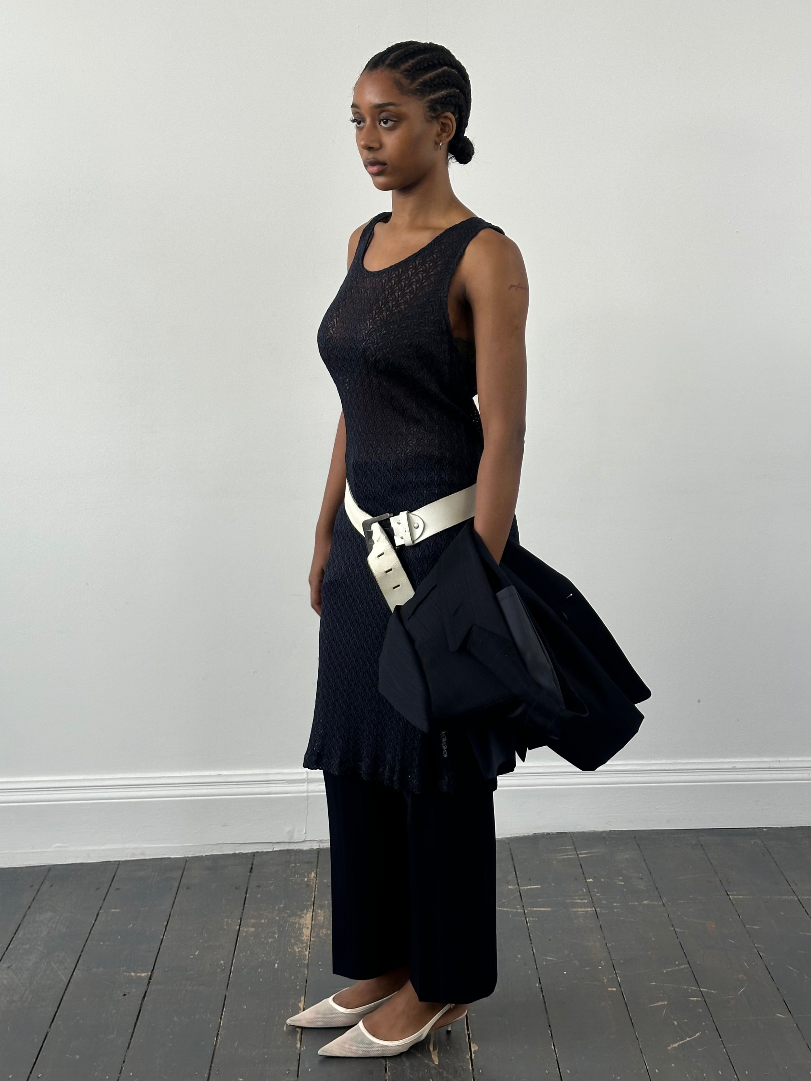 Vintage Italian 1990s open-knit midi dress in size M, showcasing lightweight knit fabric and classic midi length.