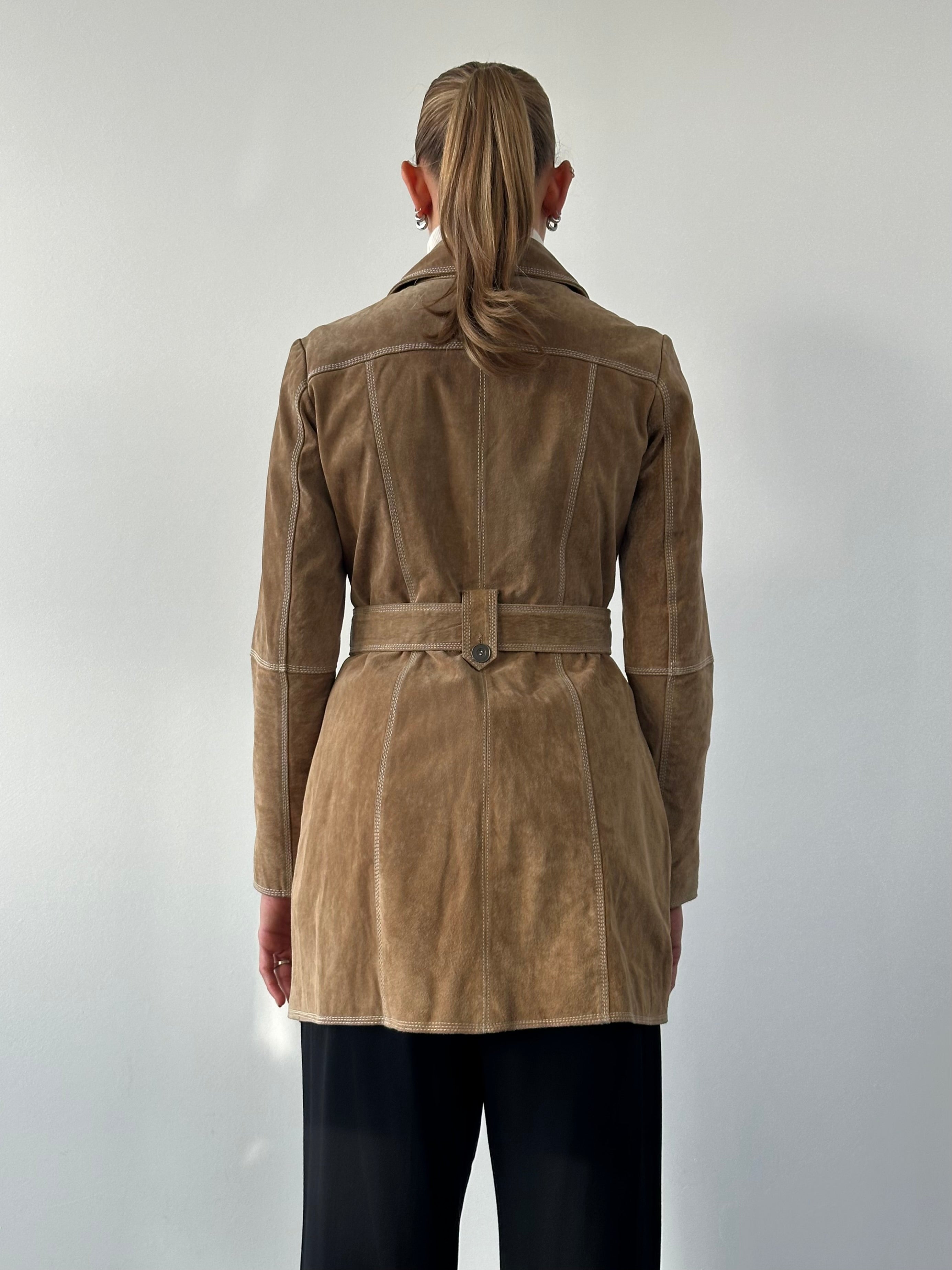 Vintage suede belted jacket in size M, featuring a classic design with a front belt and soft suede texture.