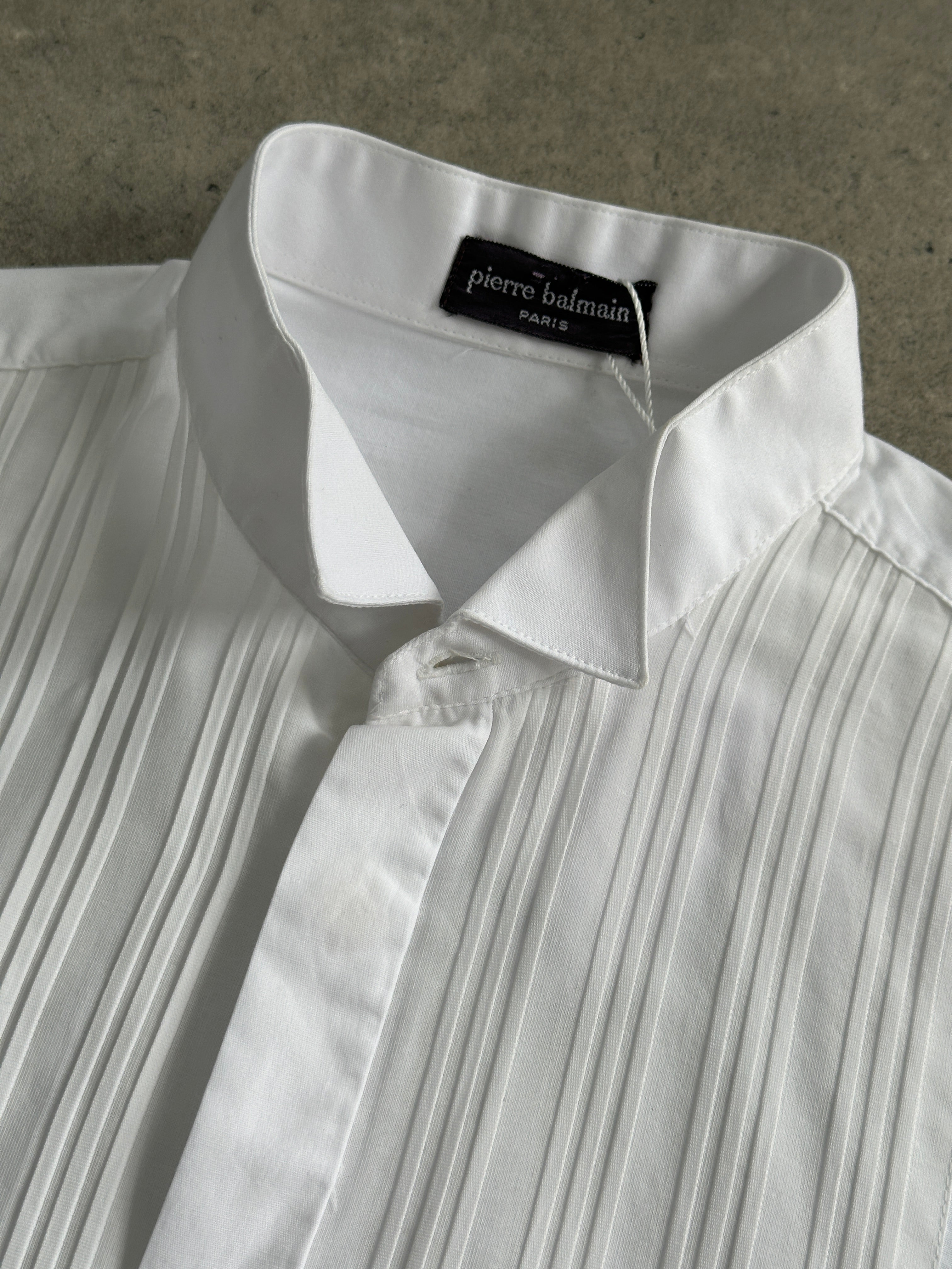 Pierre Balmain cotton tuxedo dress shirt in size M, featuring a classic white design with a button-up front and elegant collar.