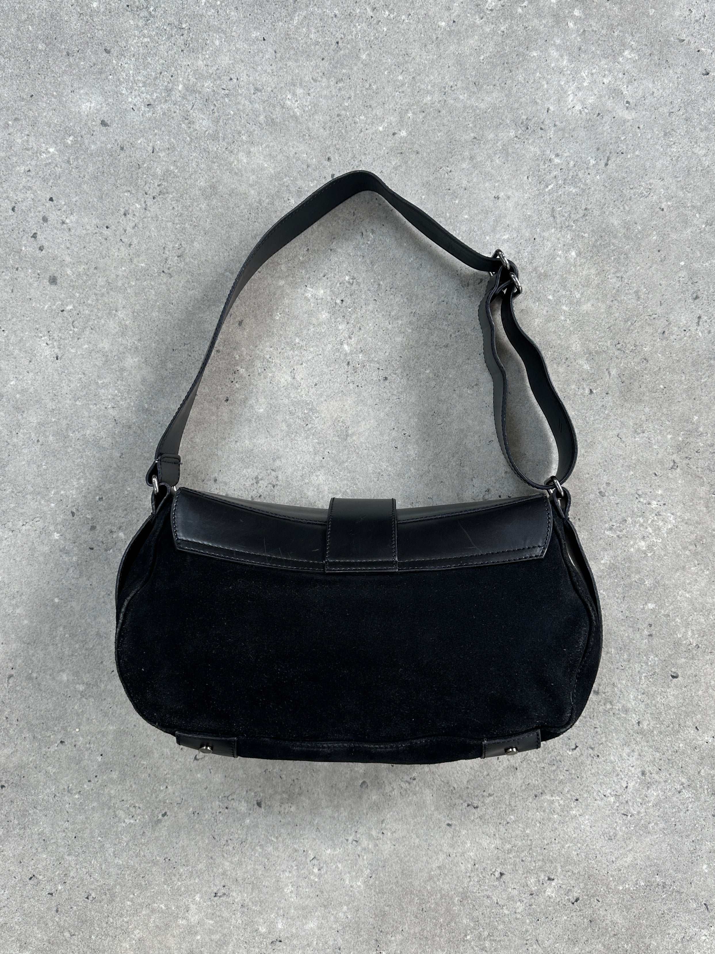 Vintage Russell & Bromley 00s leather and suede shoulder bag with classic design and structured shape.
