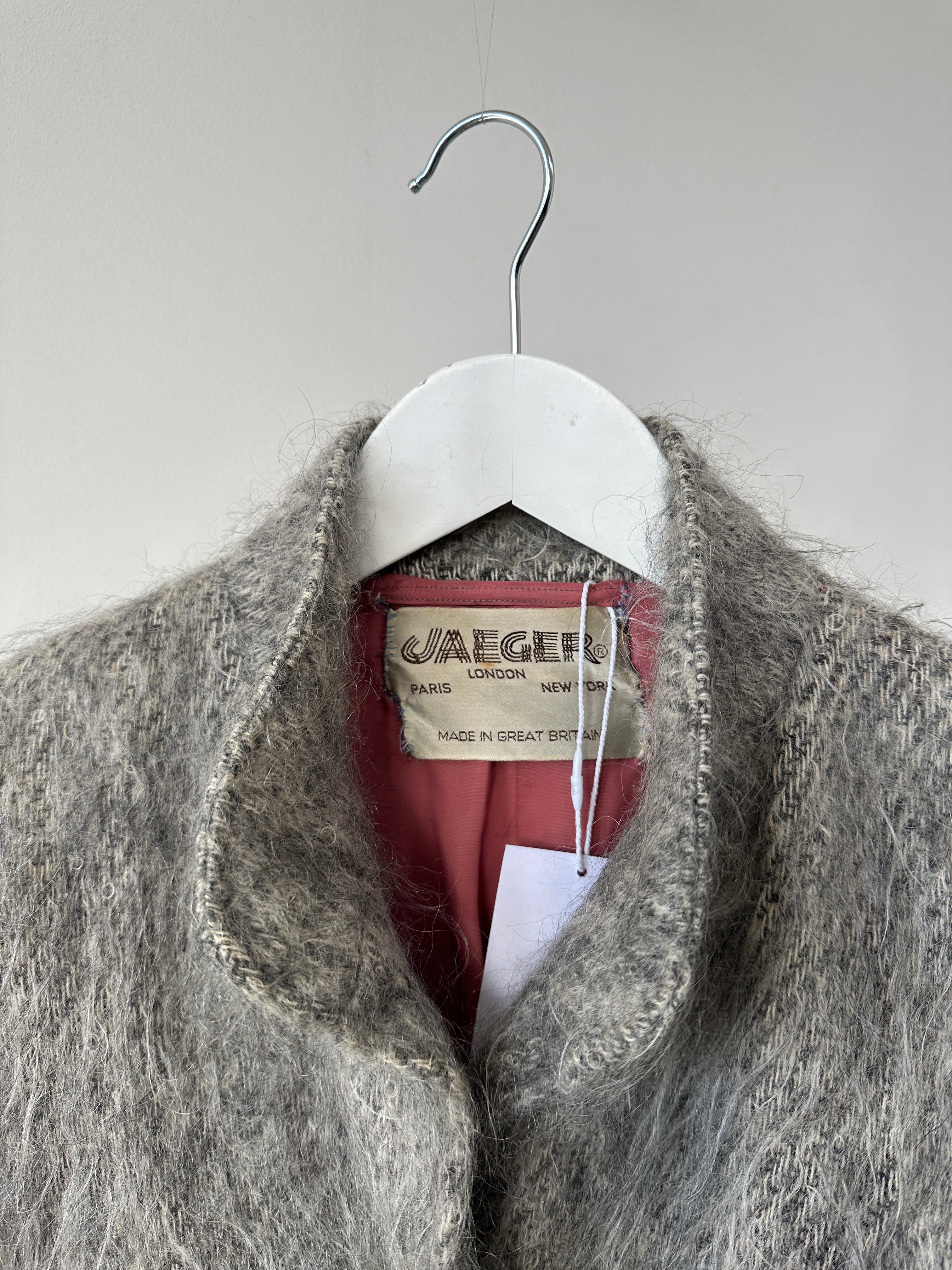 Jaeger mohair wool fuzzy belted coat in size L, featuring a cozy, textured fabric and a stylish belt for a chic winter look.