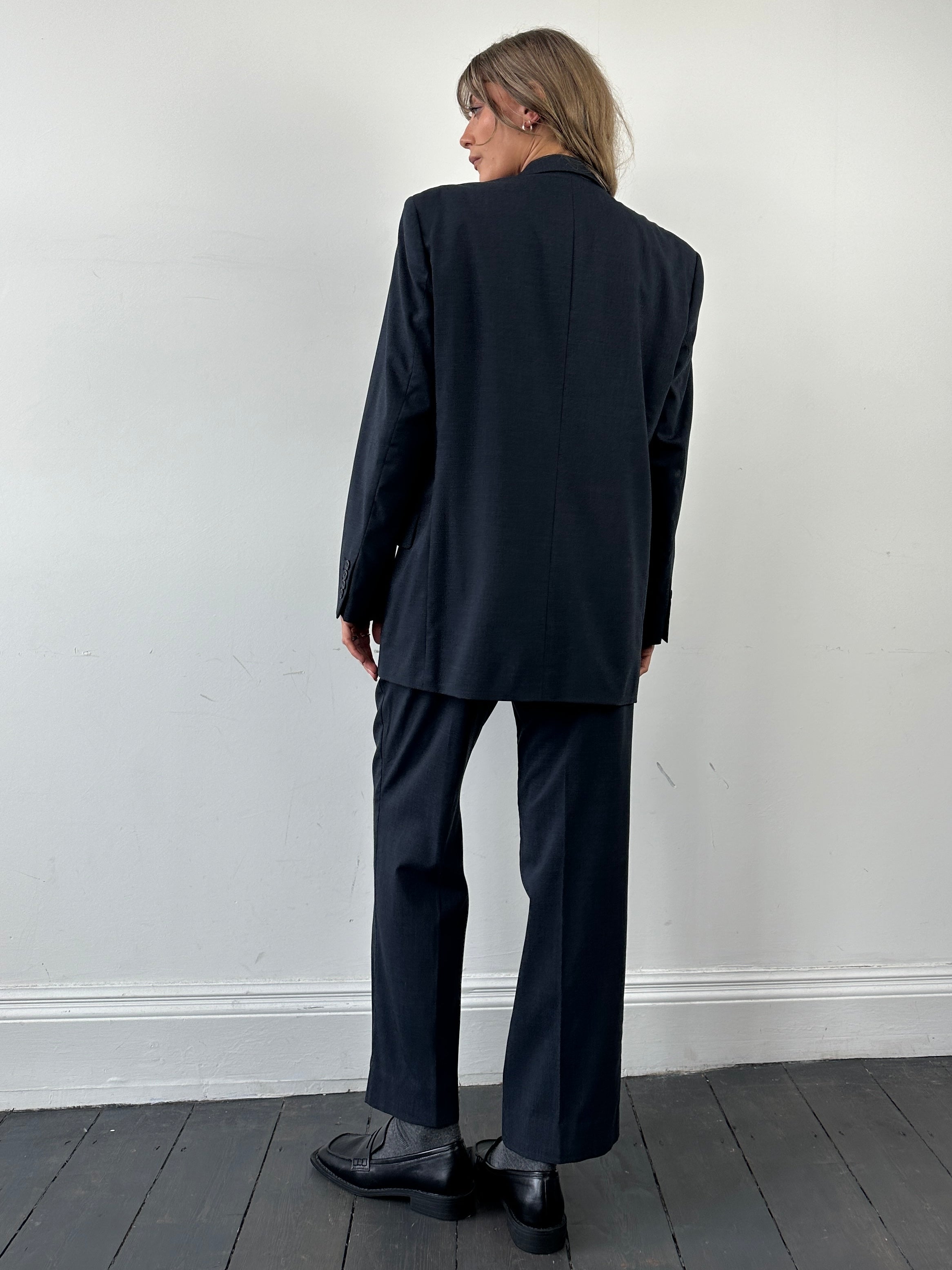 Vintage wool single-breasted suit jumpsuit in size 38R/W30, featuring classic tailored design and vintage style.