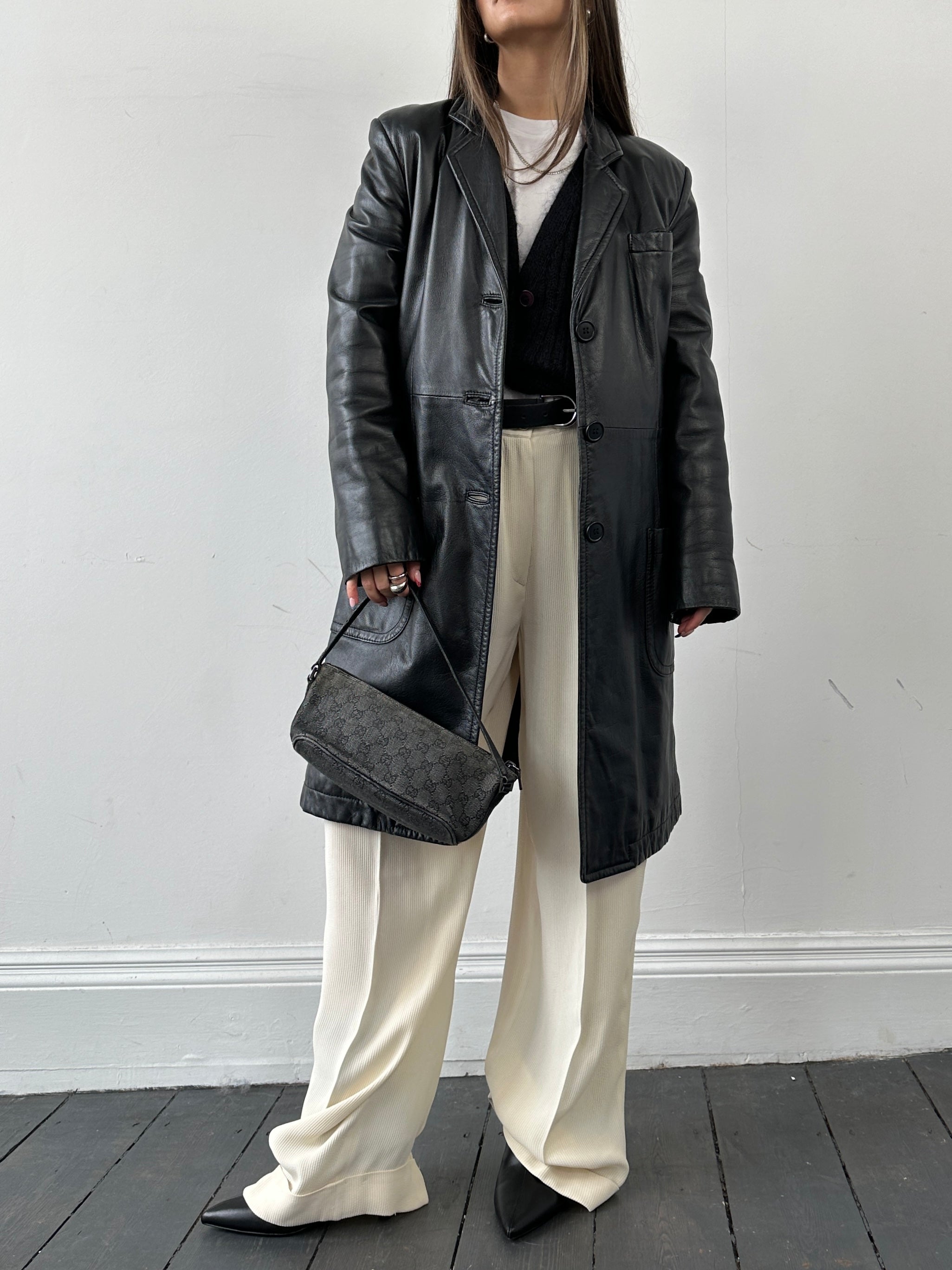 Armani leather trench coat in XS size, stylish men's jacket with smooth black leather and classic design.