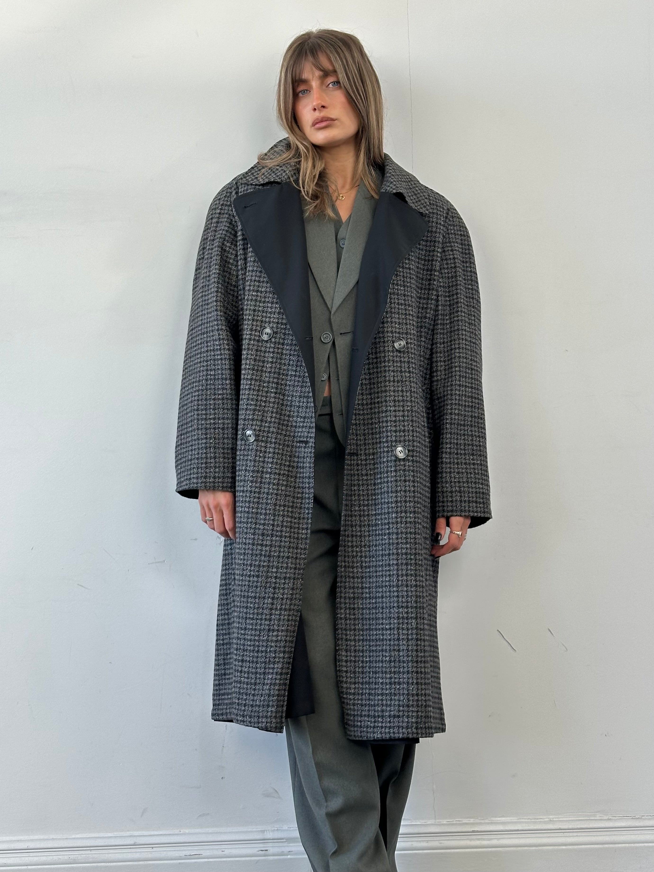 Vintage reversible wool trench coat with belt in size XL, showcasing classic design and textured fabric.