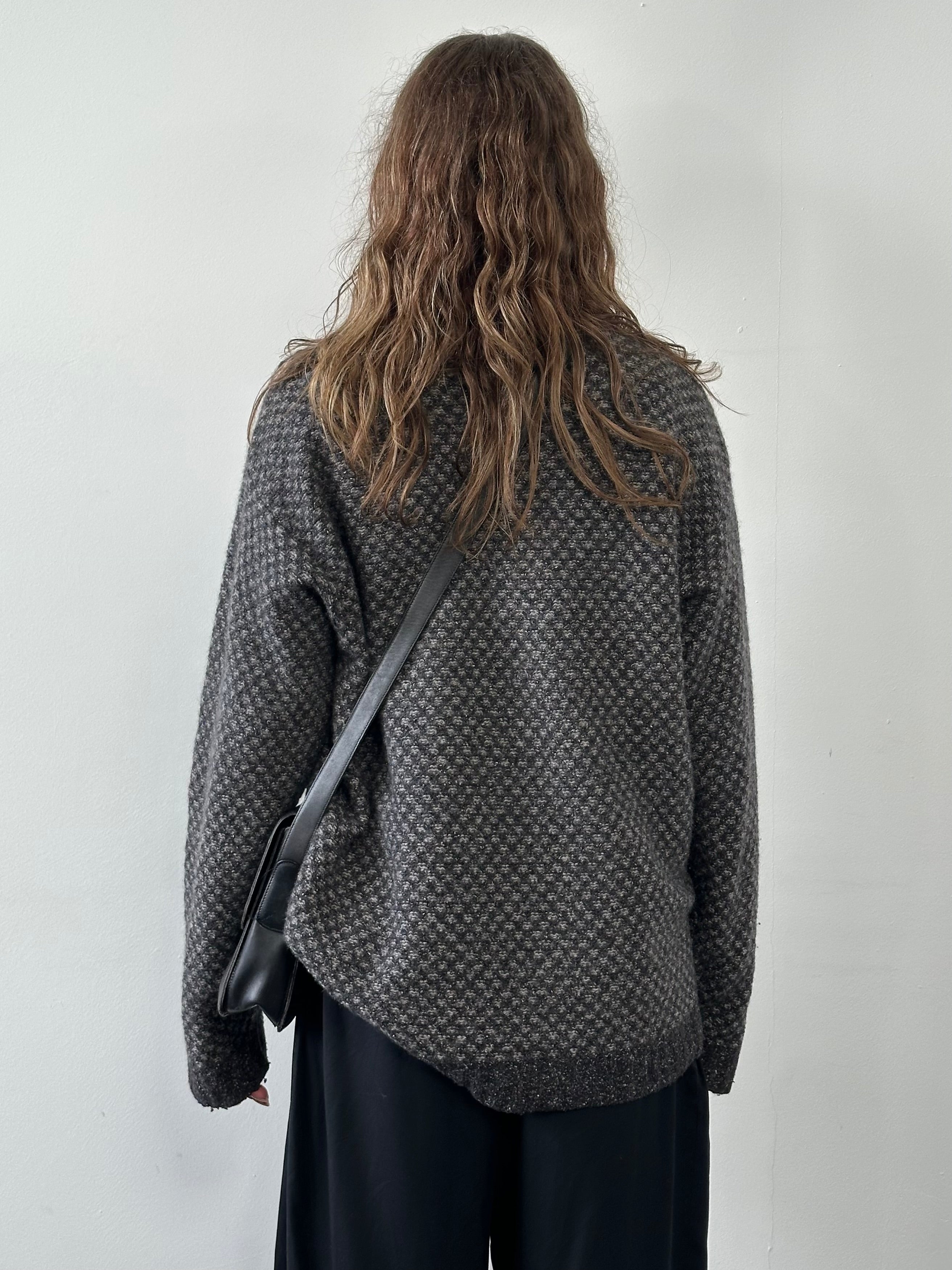 Vintage Italian 1990s V-neck wool silk knitted jumper in XL, showcasing the textured knit and classic style.