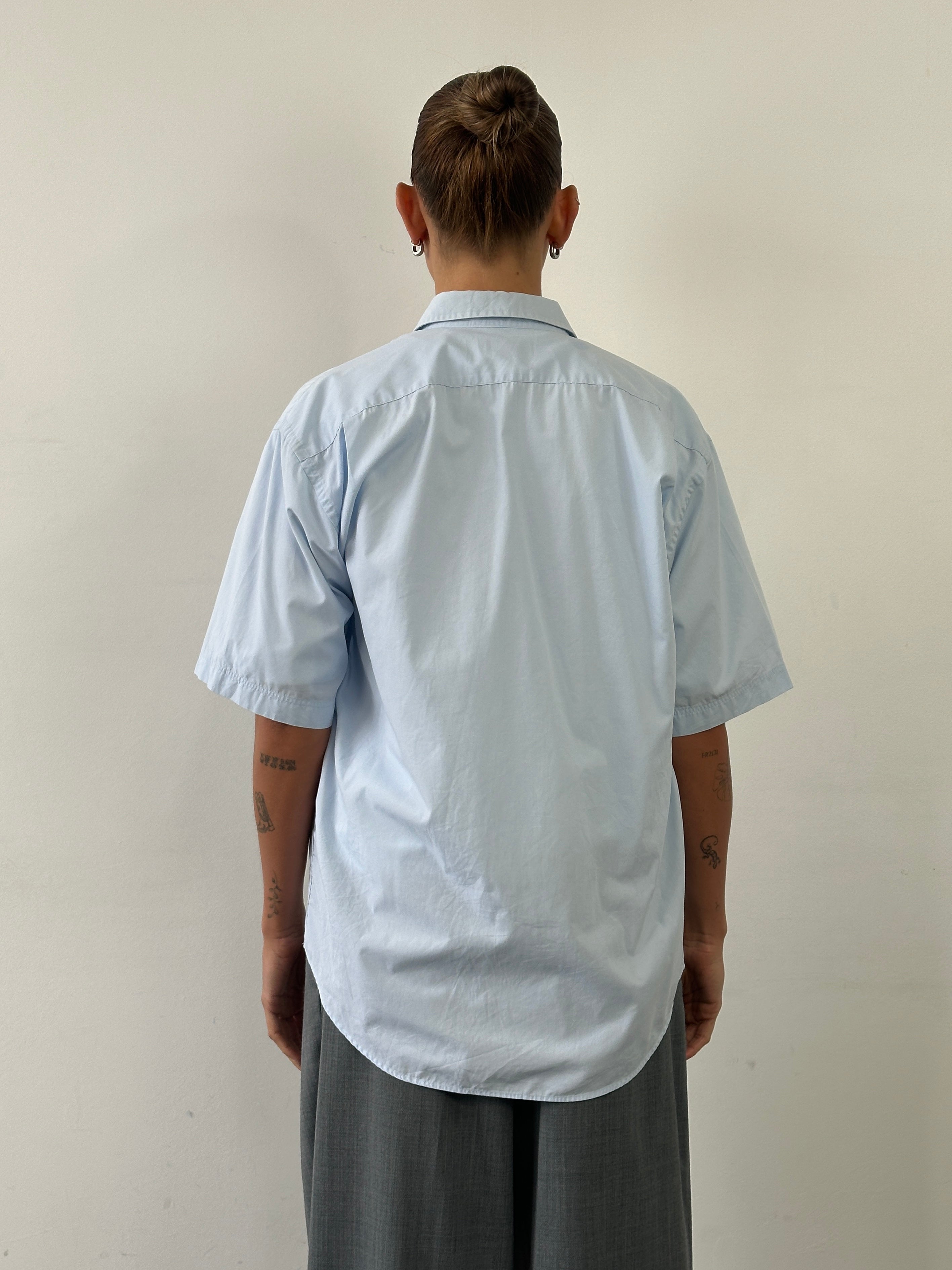 Yves Saint Laurent Pour Homme cotton short sleeve logo shirt in size L, featuring a classic design with the YSL brand logo.