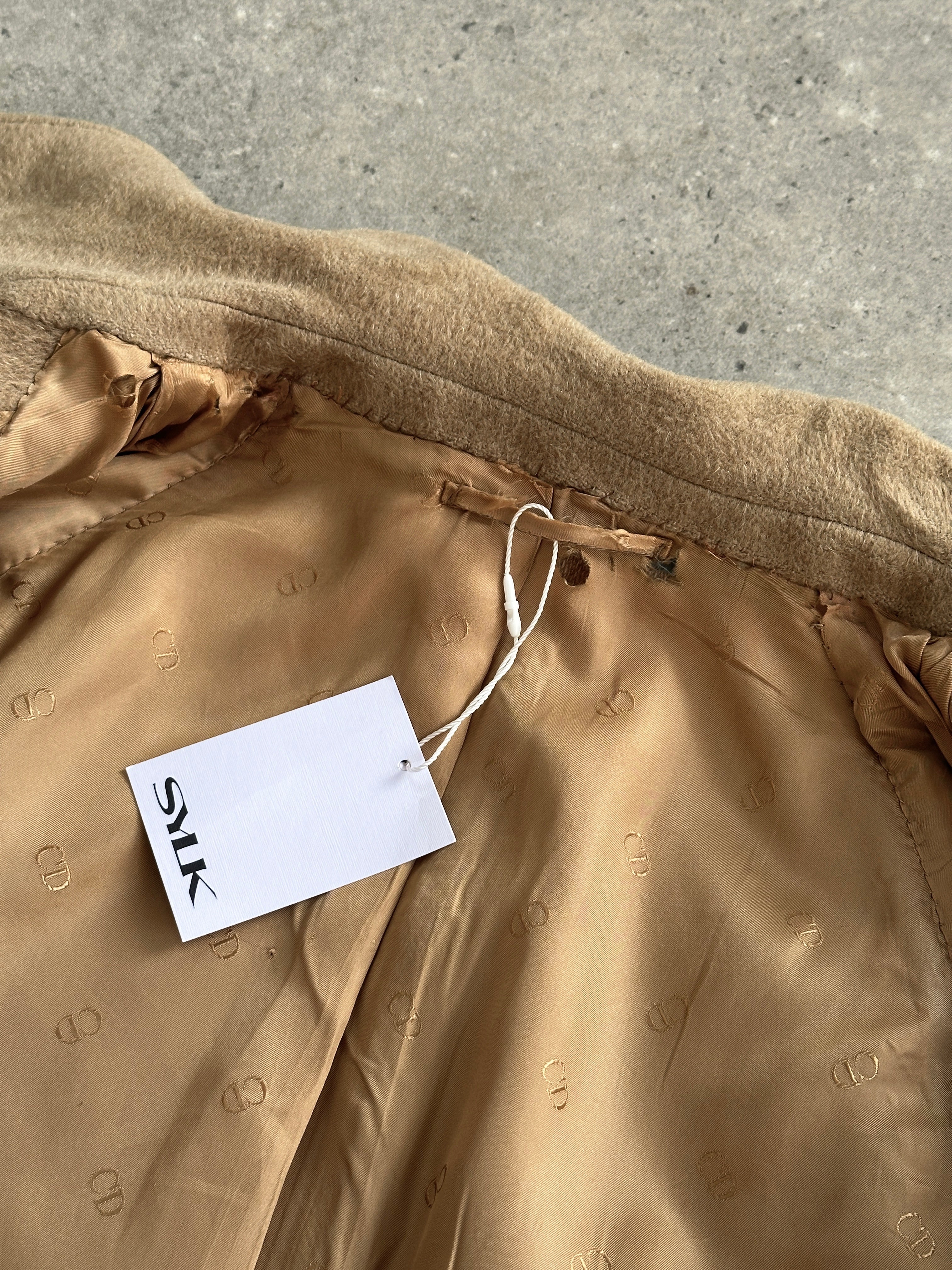 Christian Dior Monsieur 1970s wool coat with concealed placket, shown in XL/XXL size, featuring a classic tailored silhouette.