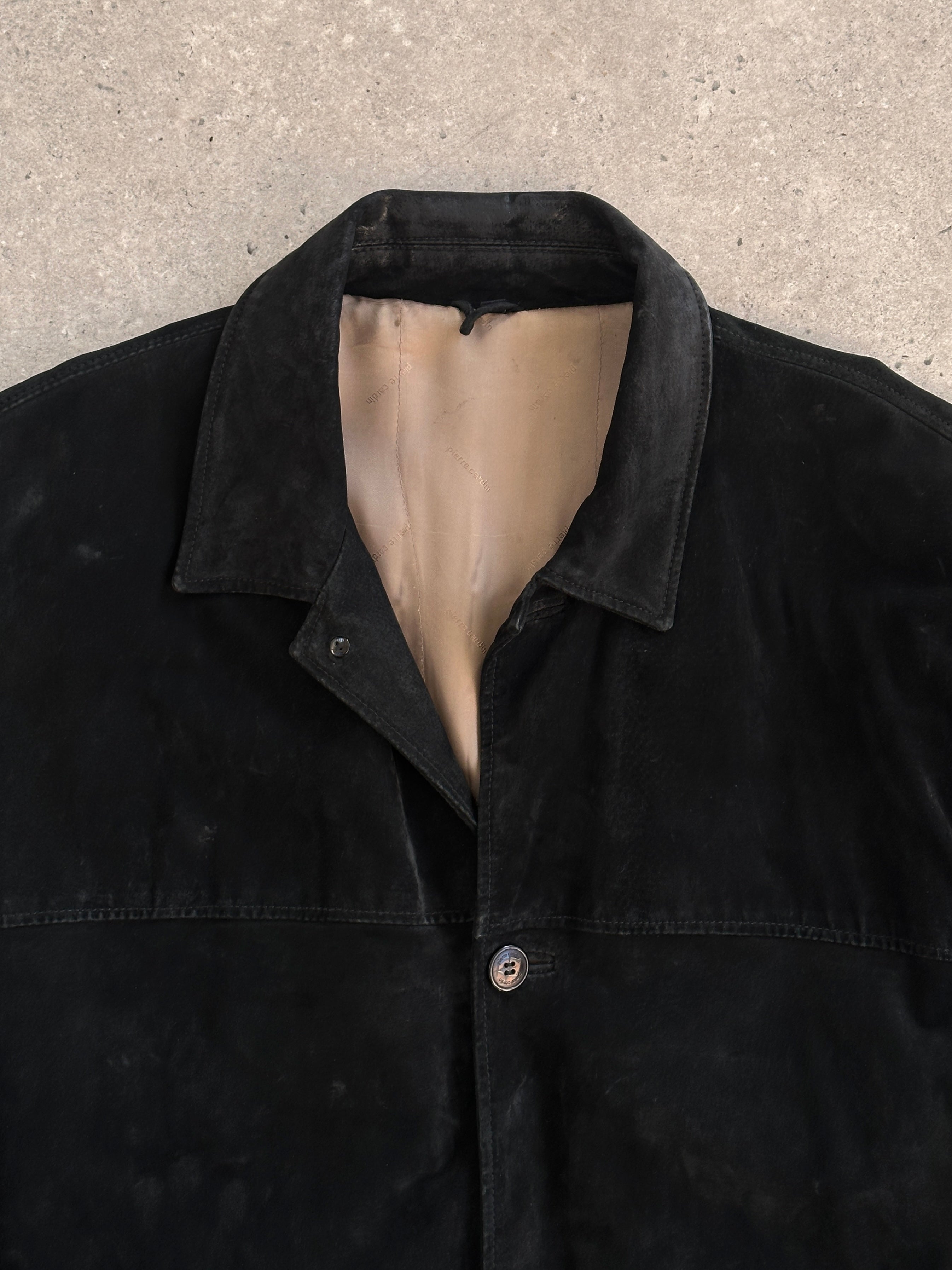 Pierre Cardin 3XL suede leather jacket displayed on a hanger with detailed stitching and classic collar design.