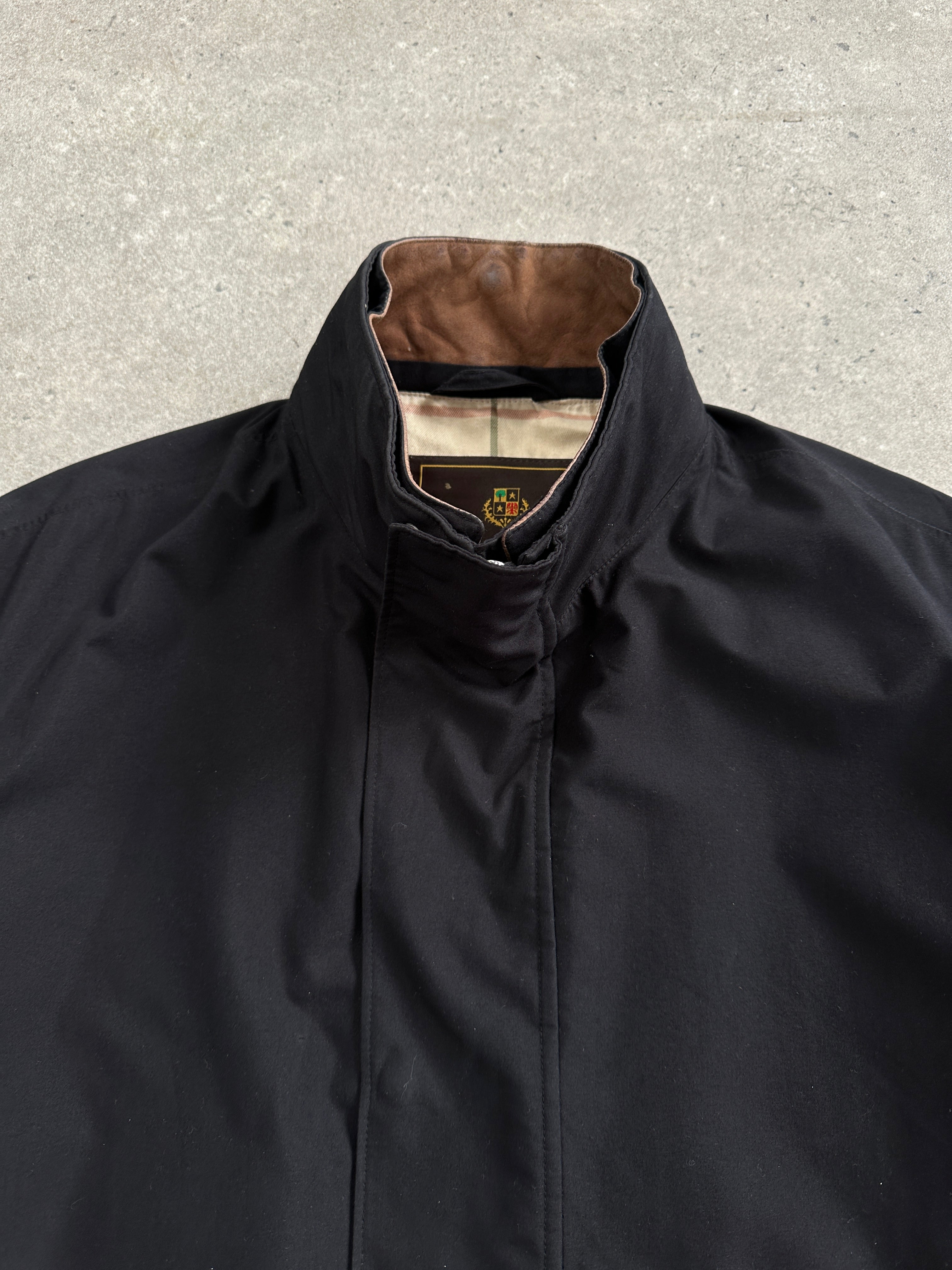 Loro Piana Storm System Traveller Jacket in XL, sleek navy jacket with hood and zip pockets, designed for weather protection.