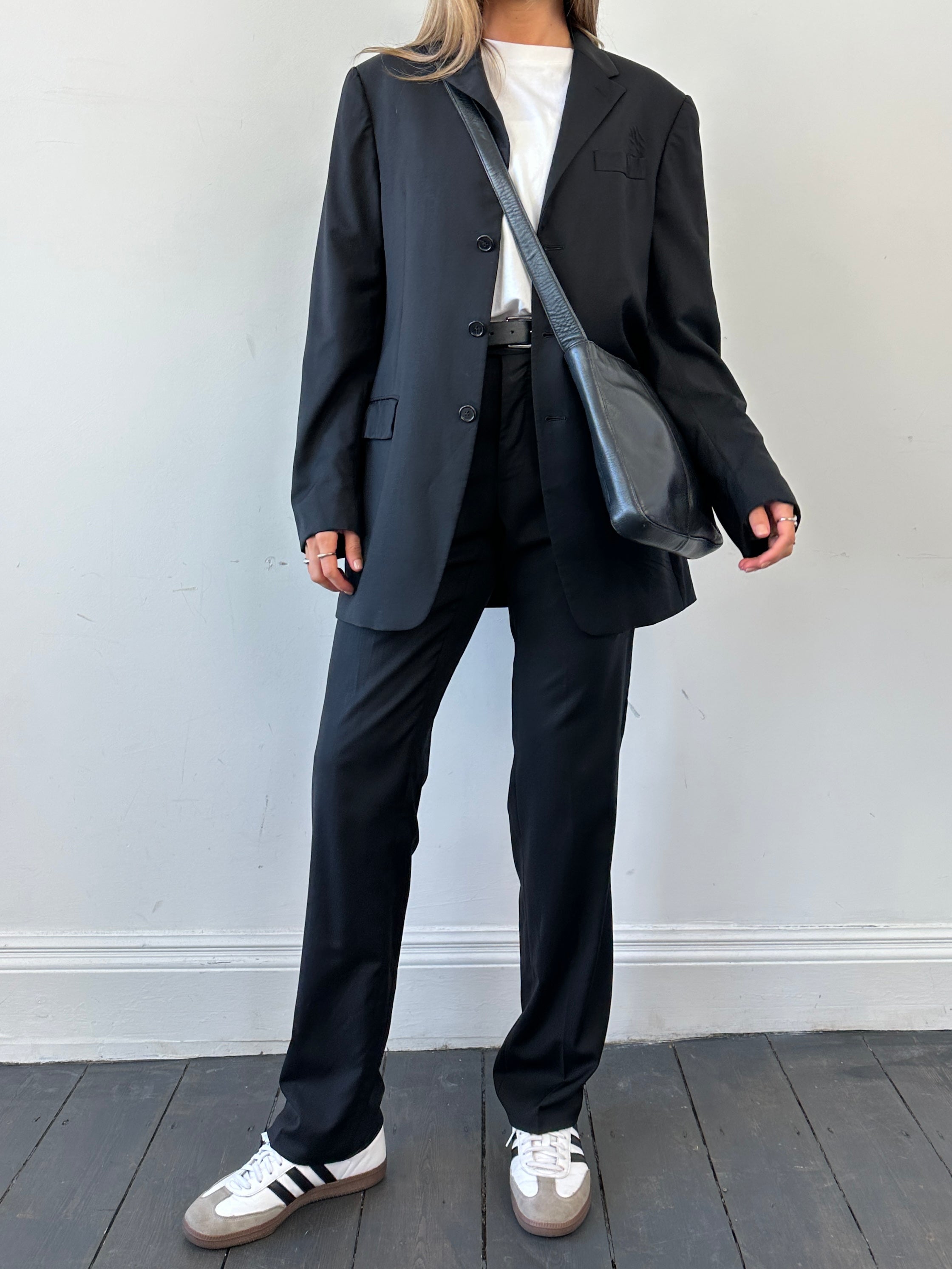 Prada virgin wool jumpsuit, mid-rise, single-breasted design in size 40L/W28, tailored fit with clean lines and sophisticated style.