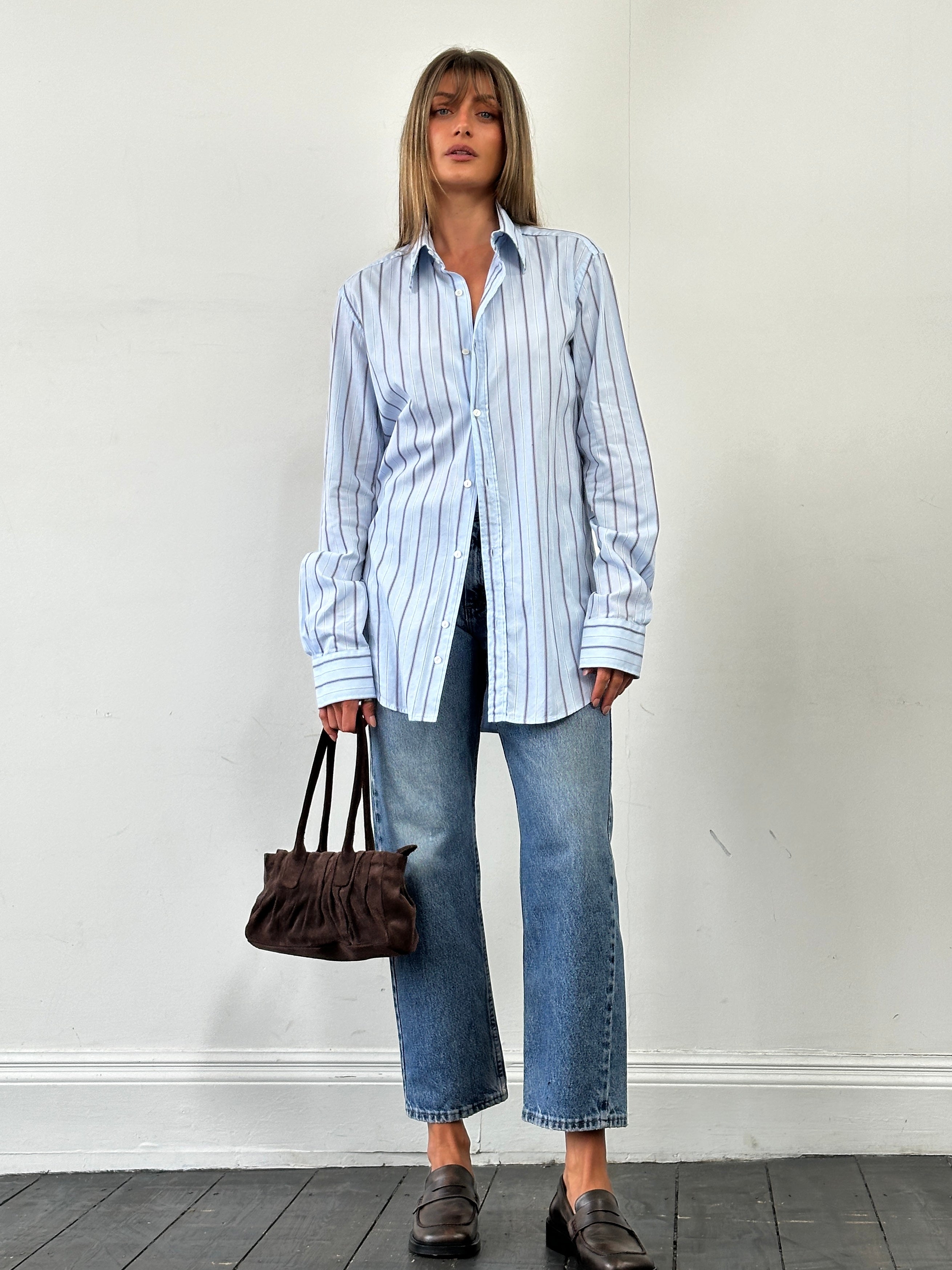 Wrangler mid wash straight leg high waisted denim jeans, size W28, showing front view with classic five-pocket design.