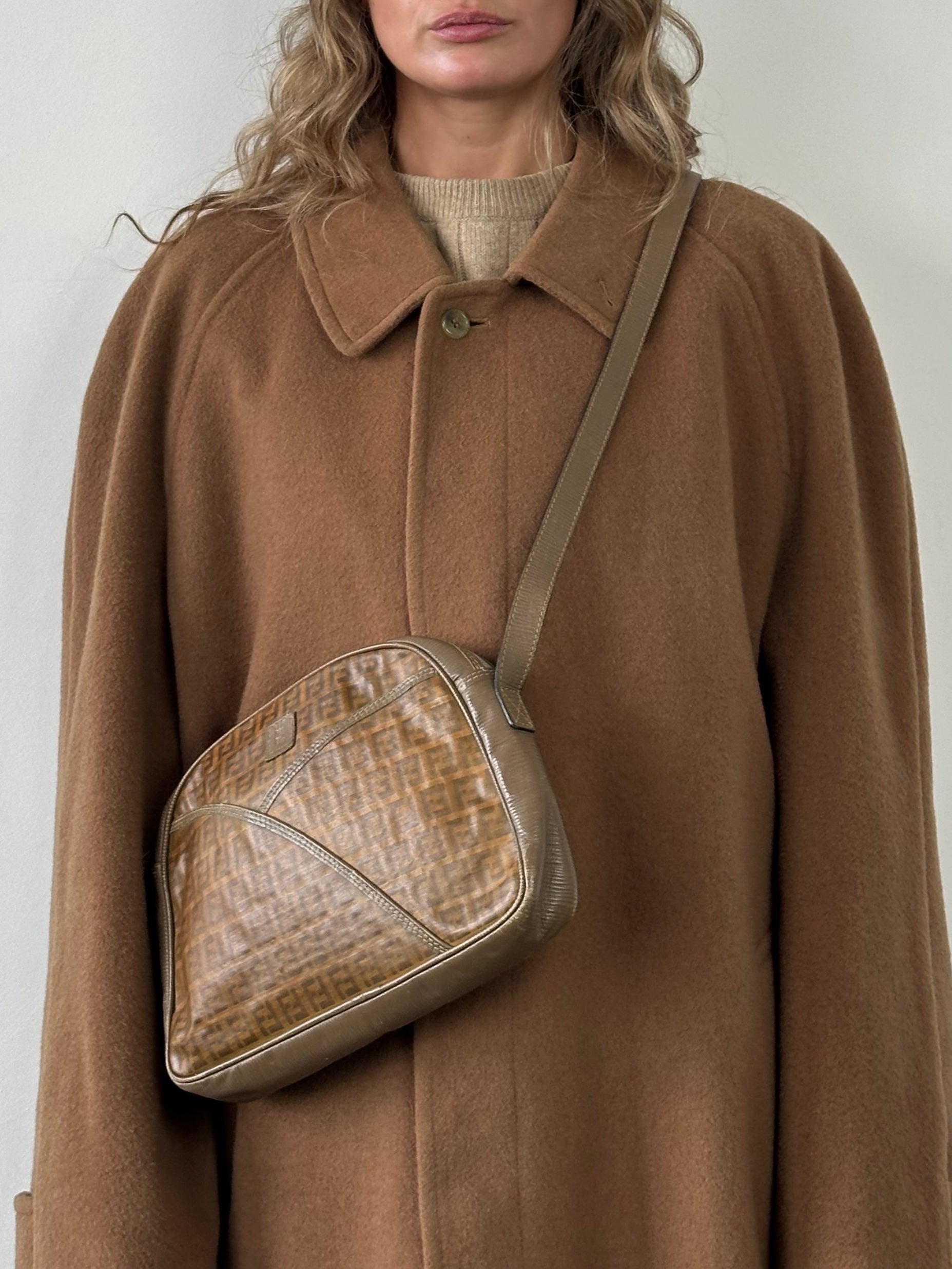 Fendi FF 1980s Monogram Crossbody Bag with adjustable strap and classic monogram pattern, stylish accessory for everyday use.