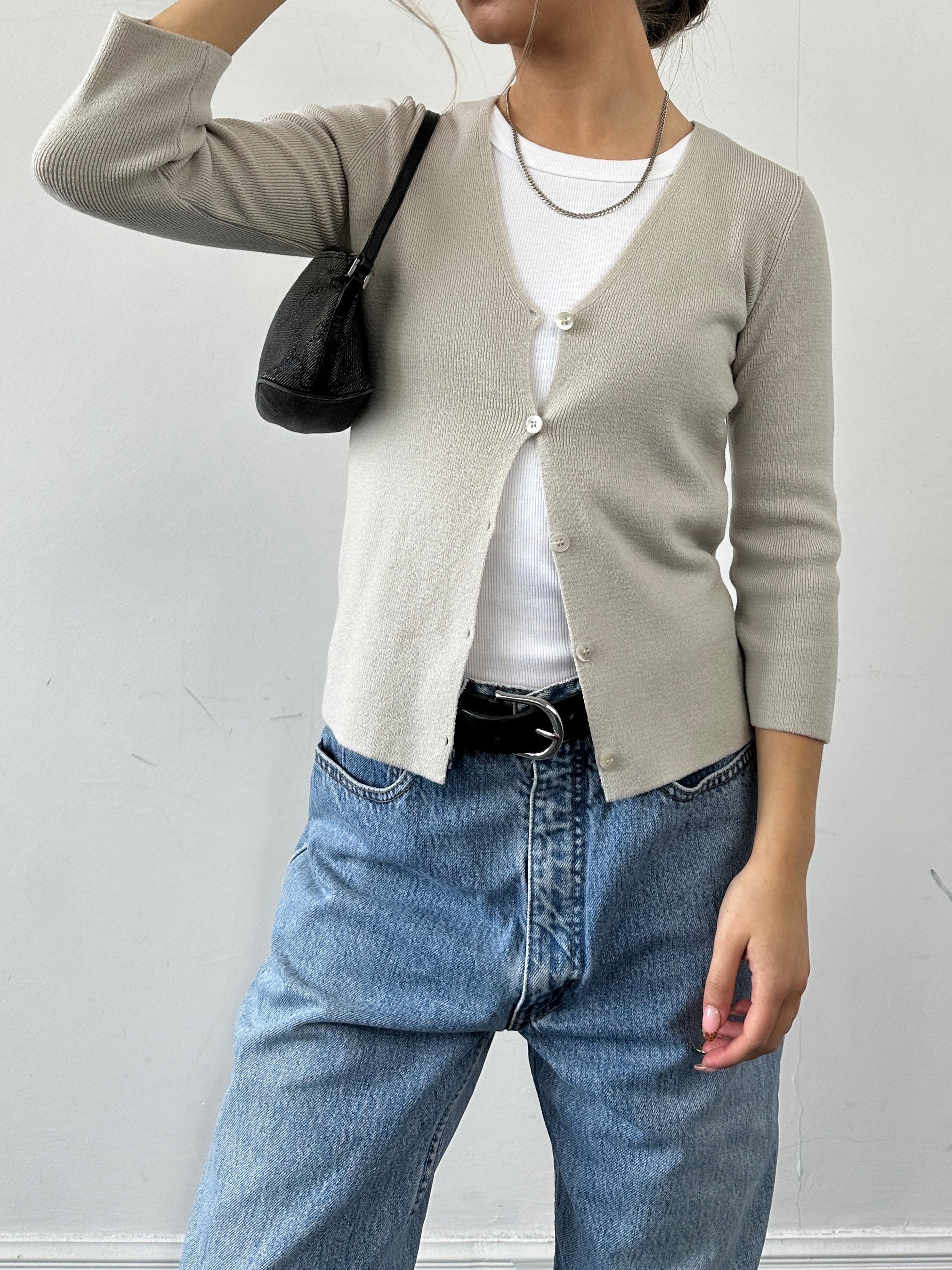 Emporio Armani merino wool cardigan in XXS/XS, beige color, with button closure and ribbed cuffs, displayed on a hanger.