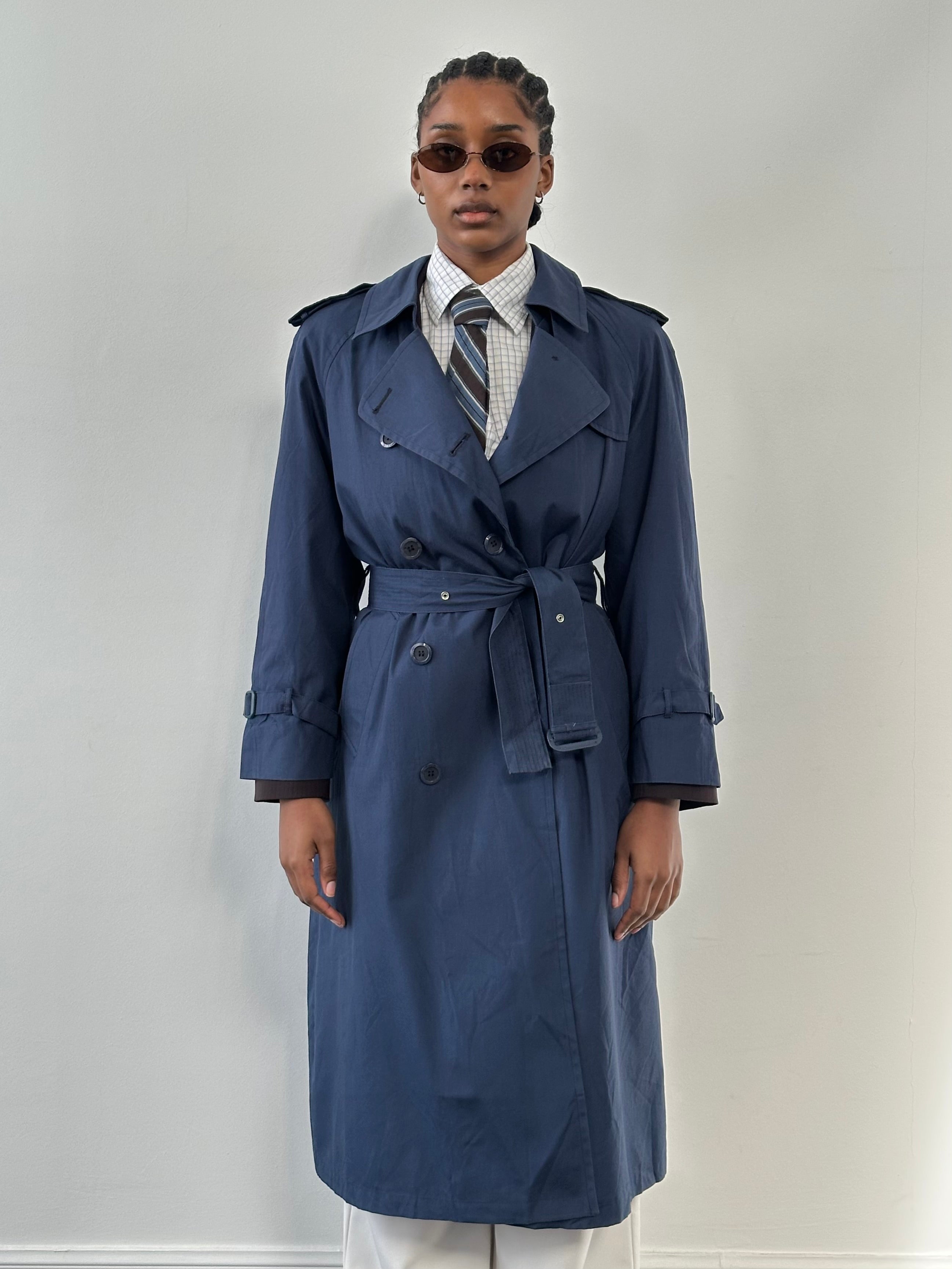London Fog 1990s double-breasted cotton trench coat in size S/M, shown in beige with classic collar and belted waist.