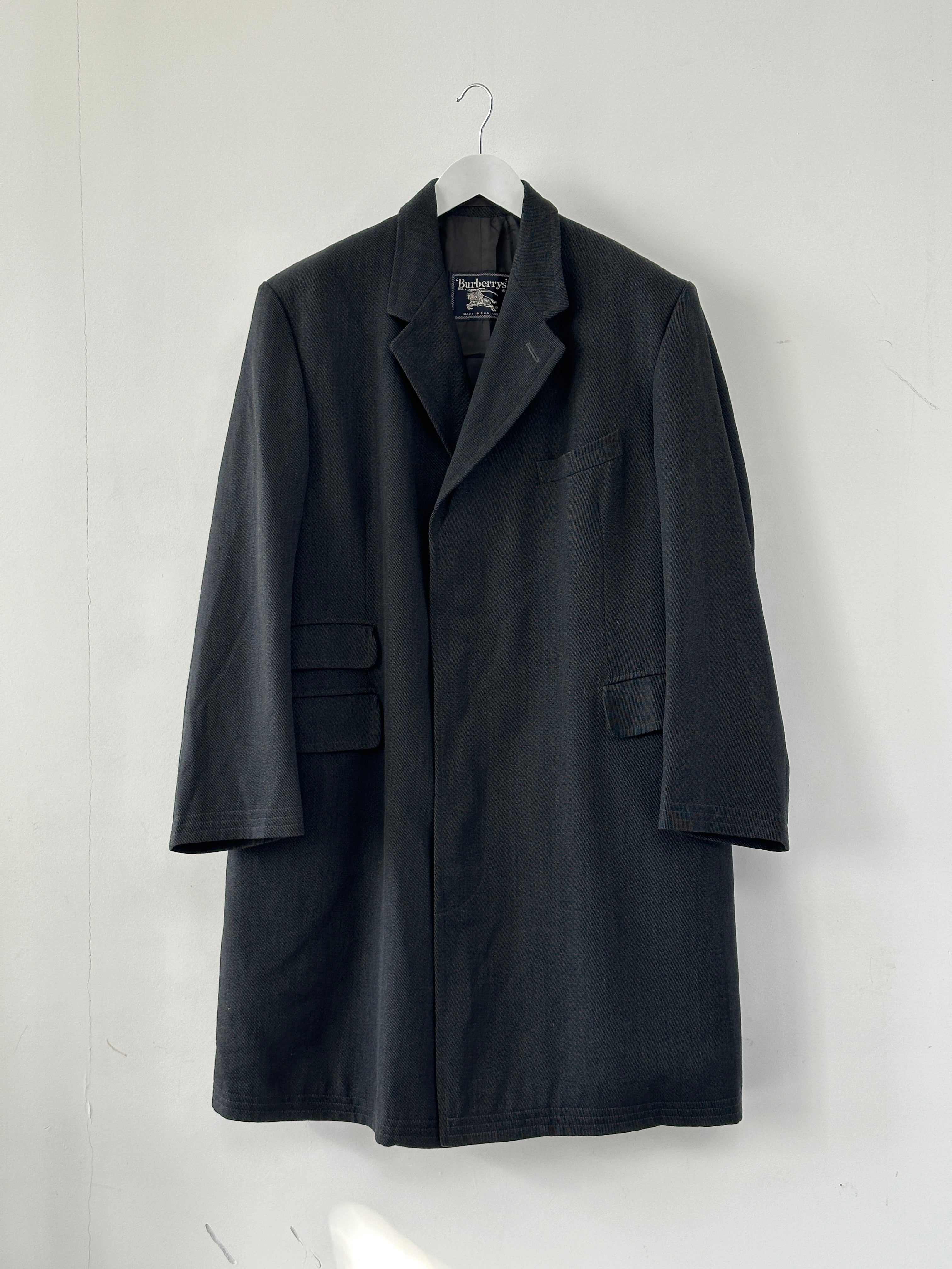 Burberry 1990s XXL pure wool twill coat with concealed placket, featuring classic design and tailored fit.