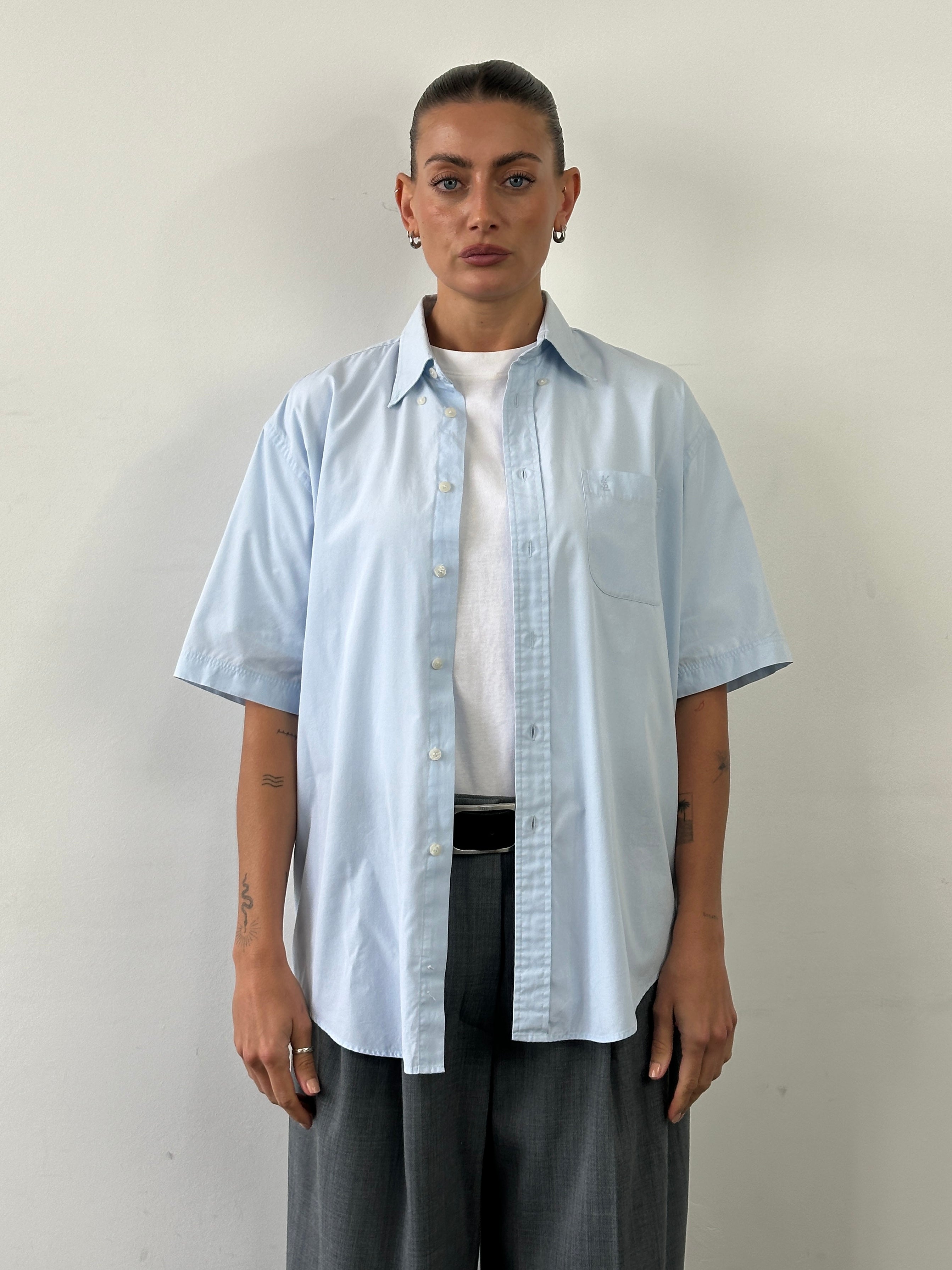 Yves Saint Laurent Pour Homme cotton short sleeve logo shirt in size L, featuring classic design and brand logo on the front.