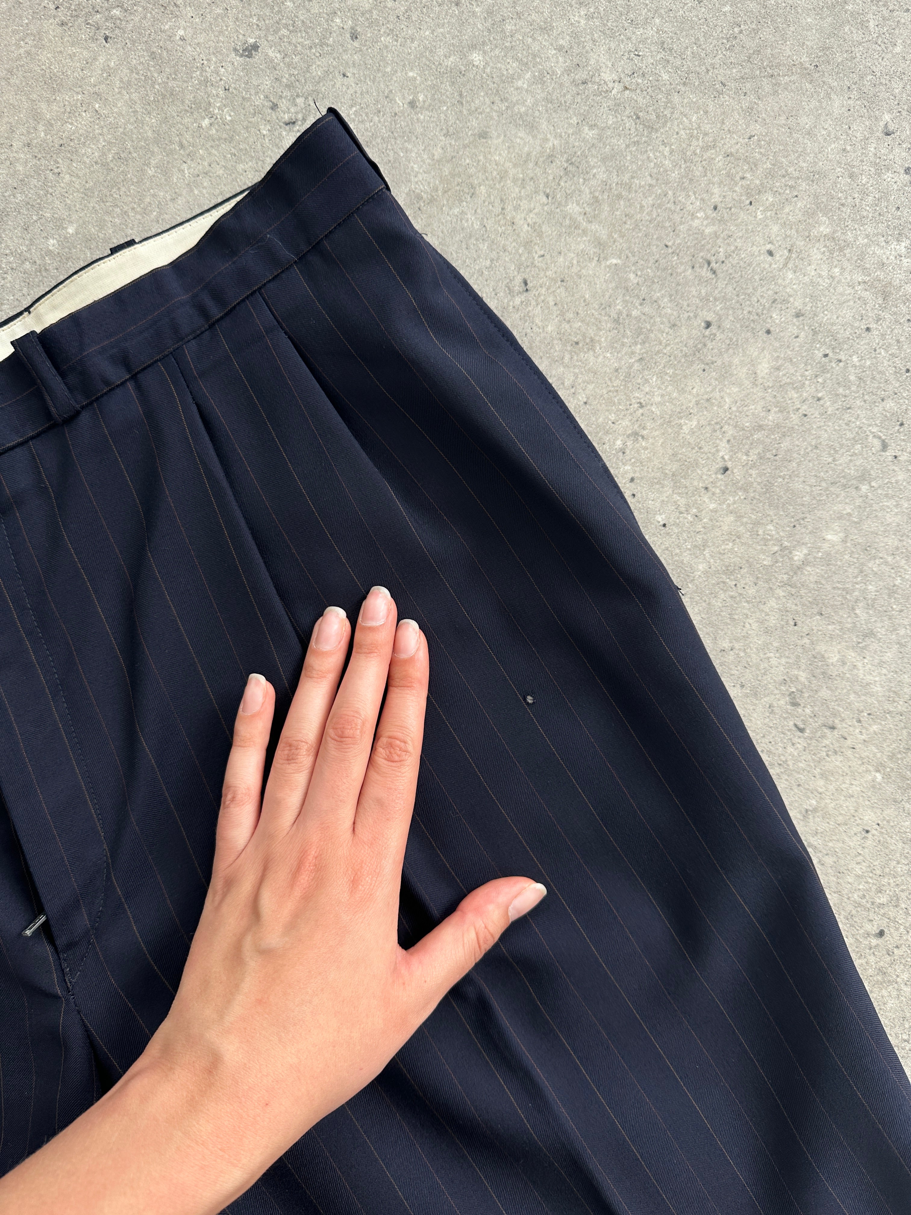 Christian Dior pinstripe pure wool double-breasted suit jumpsuit in size 44R/W34, featuring tailored lapels and classic design.