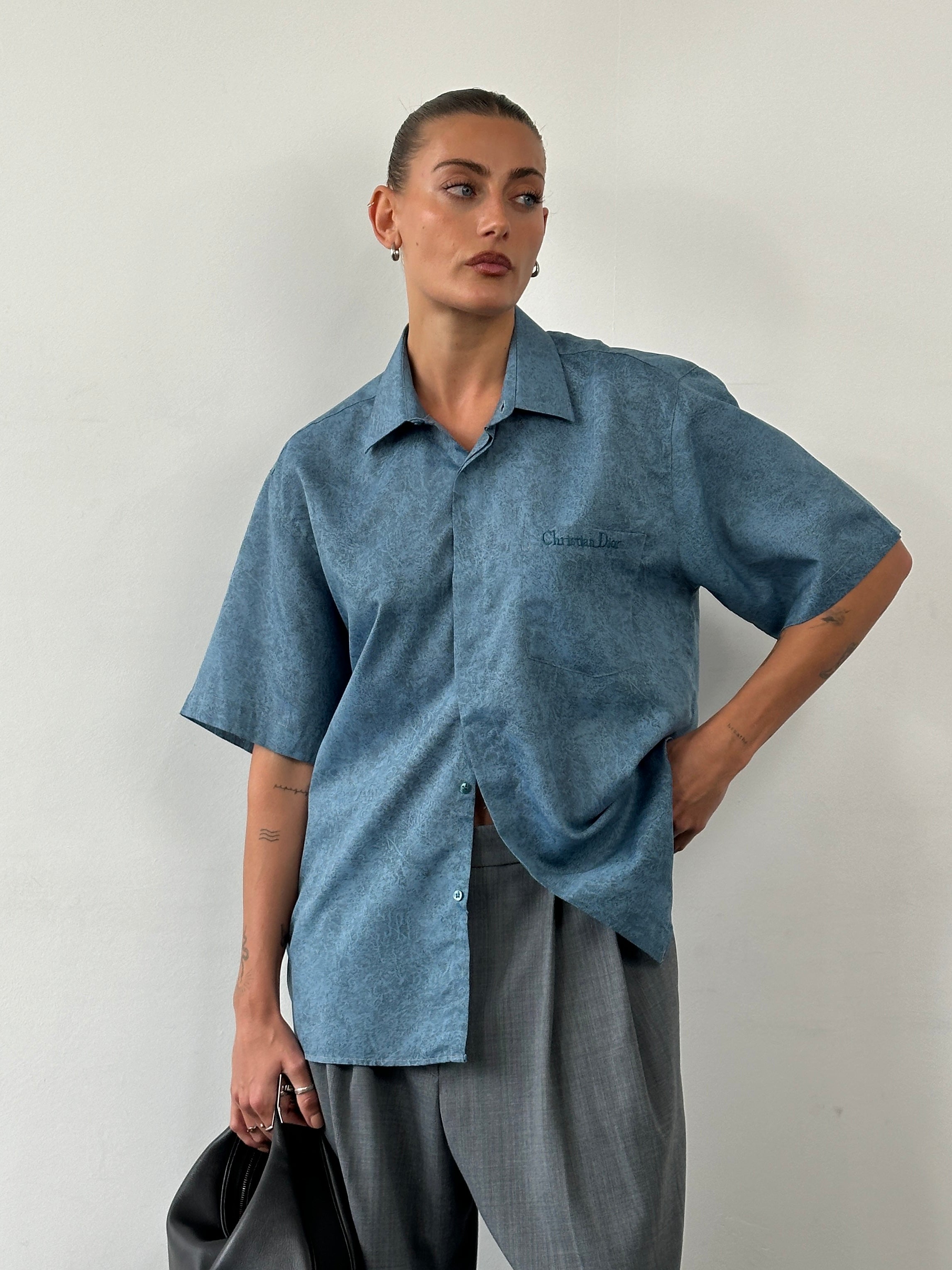 Christian Dior silk print short sleeve logo shirt in size L, featuring a stylish design and classic fit.