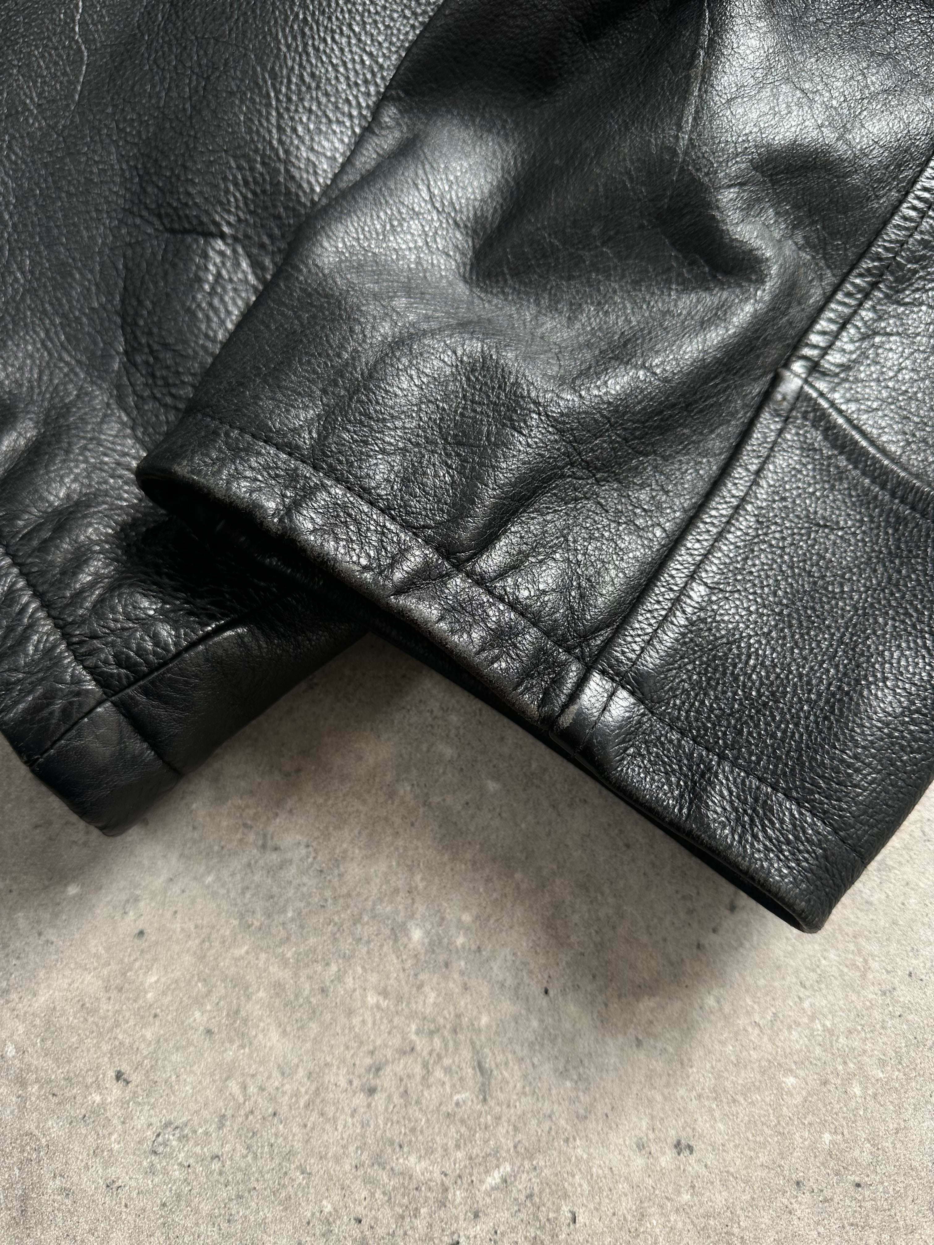 Vintage 1990s heavyweight leather jacket in XXL, minimal design, rugged leather with classic styling, front view.