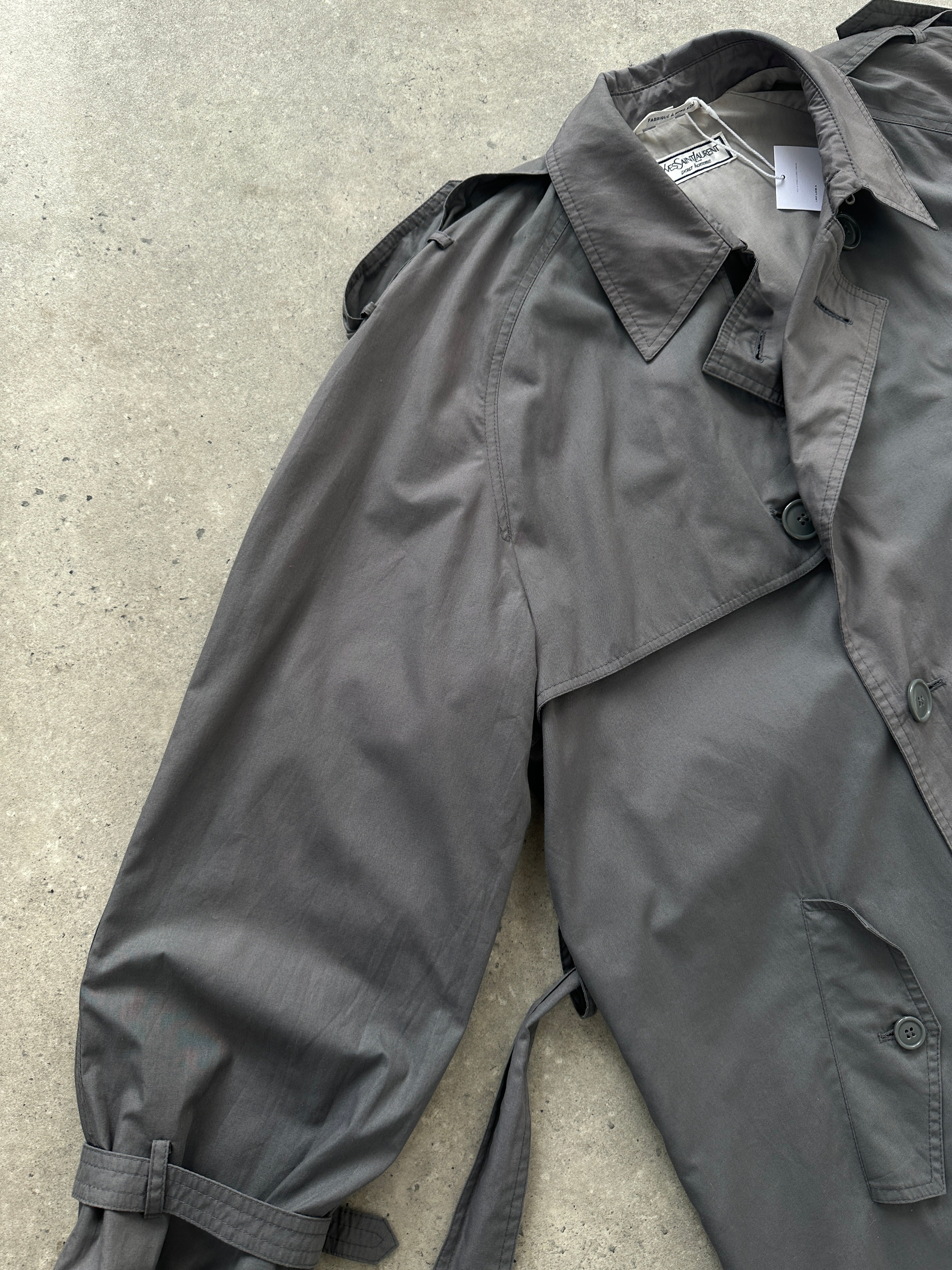 Yves Saint Laurent men's double-breasted belted trench coat in XL/XXL, beige fabric, front view with collar and belt.