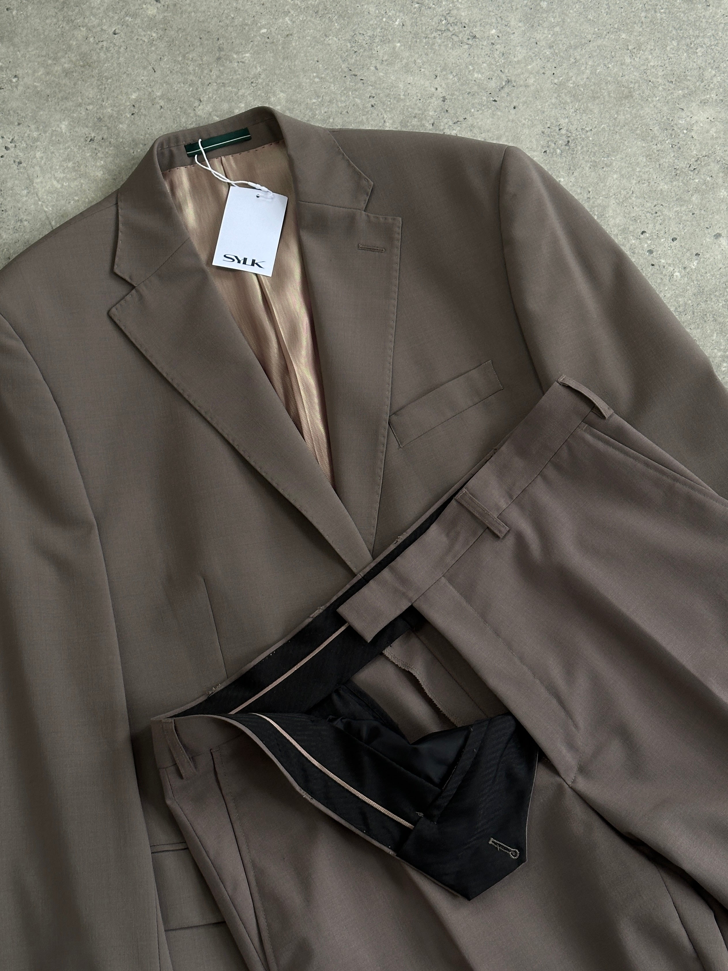 Vintage wool vintage jumpsuit in size 42S/W34, featuring a single-breasted design and classic tailored fit.