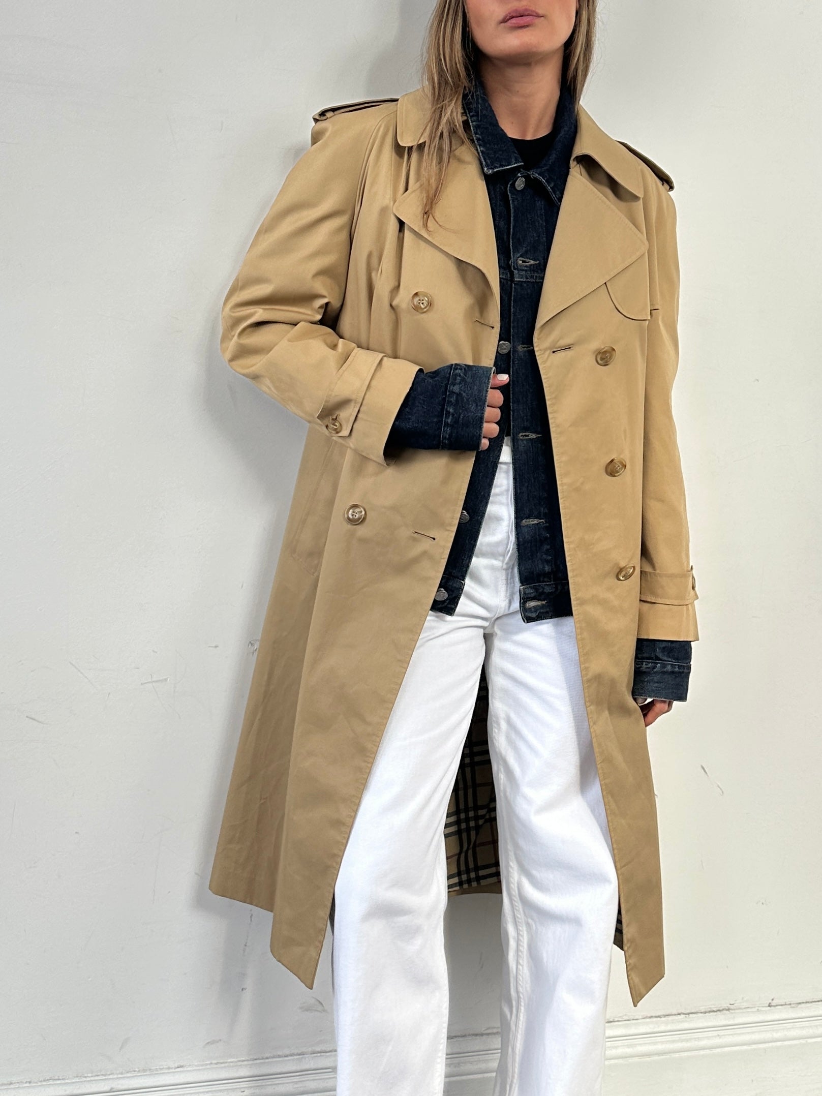 Vintage cotton double-breasted belted trench coat in size L, featuring classic design and timeless style.